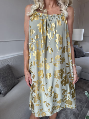 SunLove Gold Flower - Klänning med elastiskt band och stora blad i guld