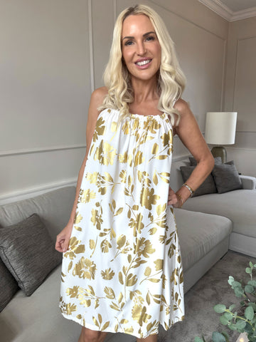 SunLove Gold Flower - Klänning med elastiskt band och stora blad i guld