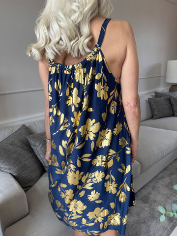 SunLove Gold Flower - Klänning med elastiskt band och stora blad i guld