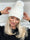 Tasha - Stickad mössa med tofs i fuskpäls