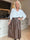 Willow - Stilfuld midi-nederdel i læderlook med elastisk talje