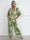 Pams Gold Leaf Jumpsuit - Elastisk buksedragt med blad mønster og guld dutter