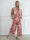 Pams Gold Leaf Jumpsuit - Elastisk buksedragt med blad mønster og guld dutter