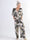 Pams Leaf Jumpsuit - Jumpsuit med resår och bladmönster i stora storlekar