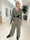 Pams Plain Jumpsuit L/S - En enfärgad jumpsuit med resår