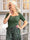 Lilli - Blus med hjärtutskärning och guldknappar