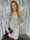 Tatiana - Elegant glitterklänning med puffärmar