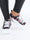 Melina - Sneakers med blommönster och bred vit sula