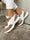 Line - Sneakers med detaljer i ormtryck - Black