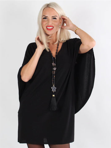 Jovana Dress - Klänning med fladdermusärmar och låg rygg