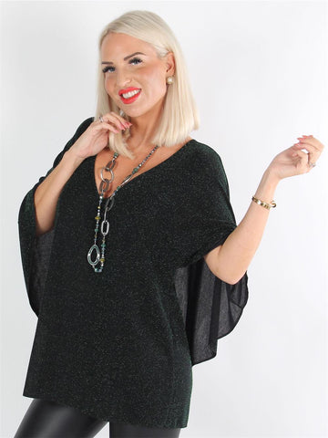 Jovana - Fin blus med fladdermusärmar och låg rygg