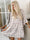Tonja - Beige mönstrad tunika med lager på lager-look