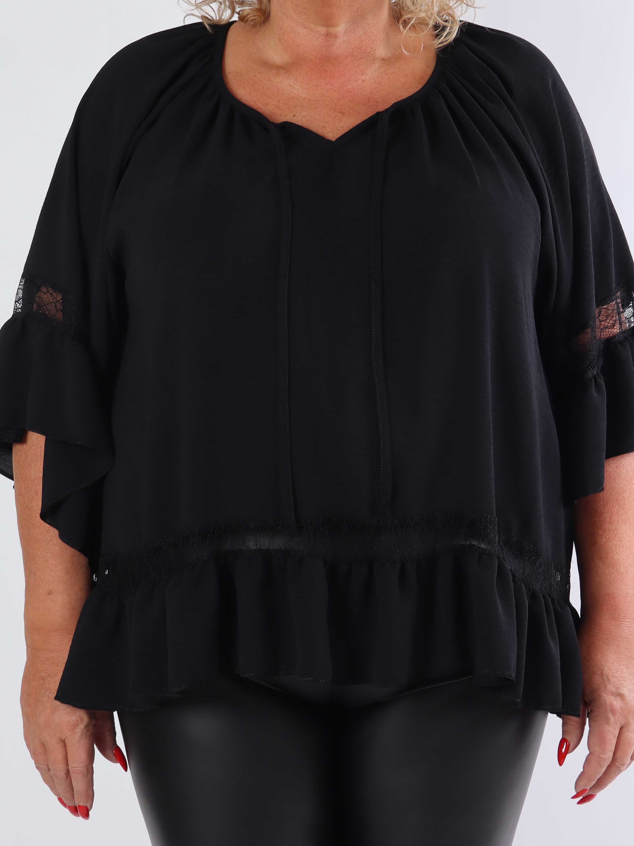 Achilla - Plus size-tunika med spetskant och volanger