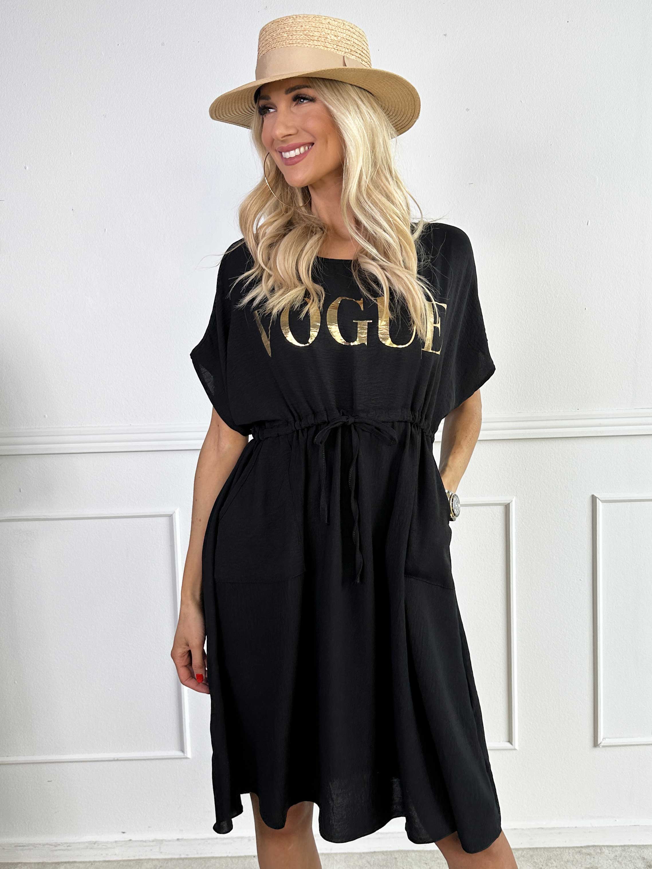 Ada - Söt klänning med vogue över bröstet