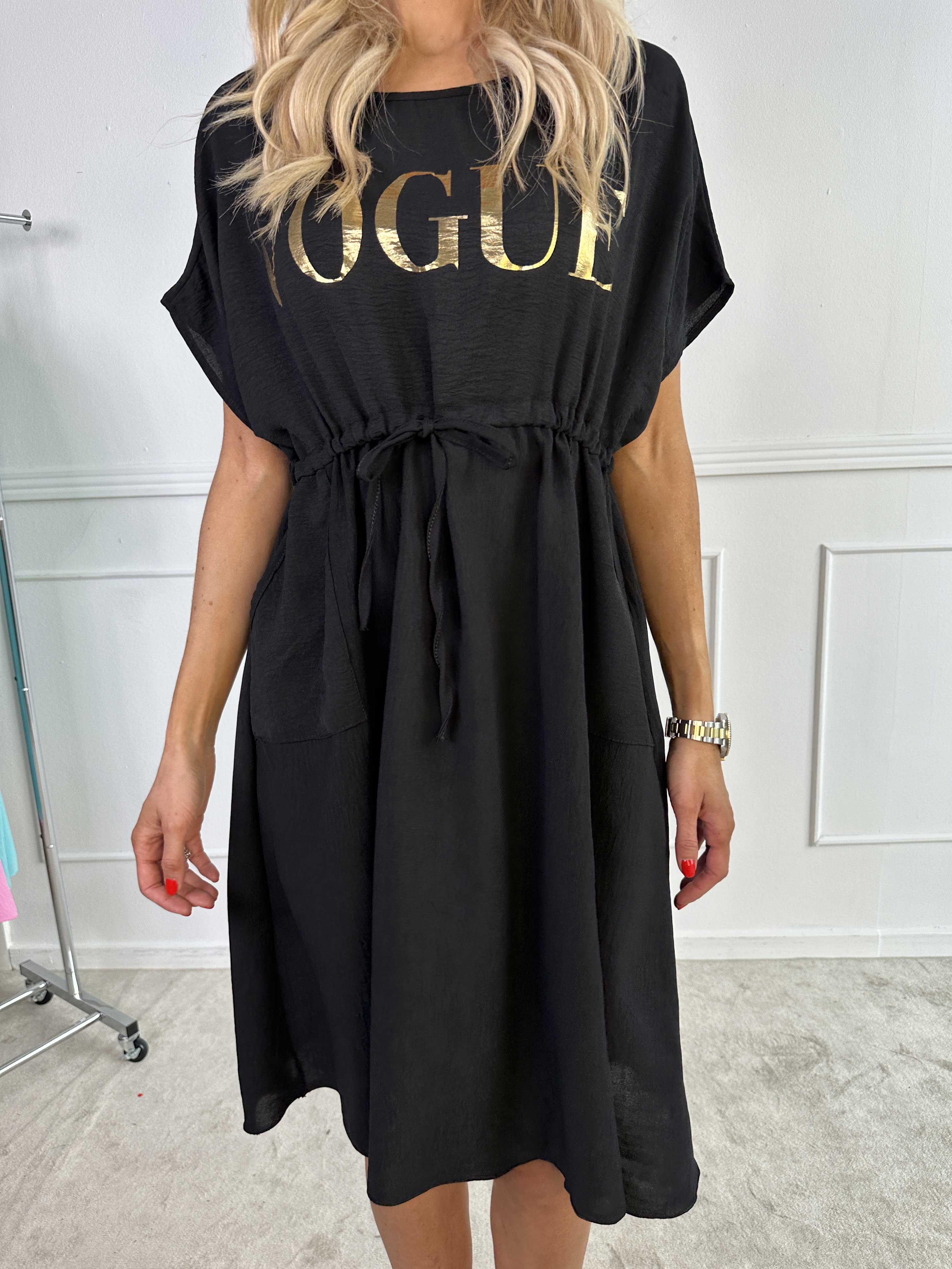 Ada - Söt klänning med vogue över bröstet