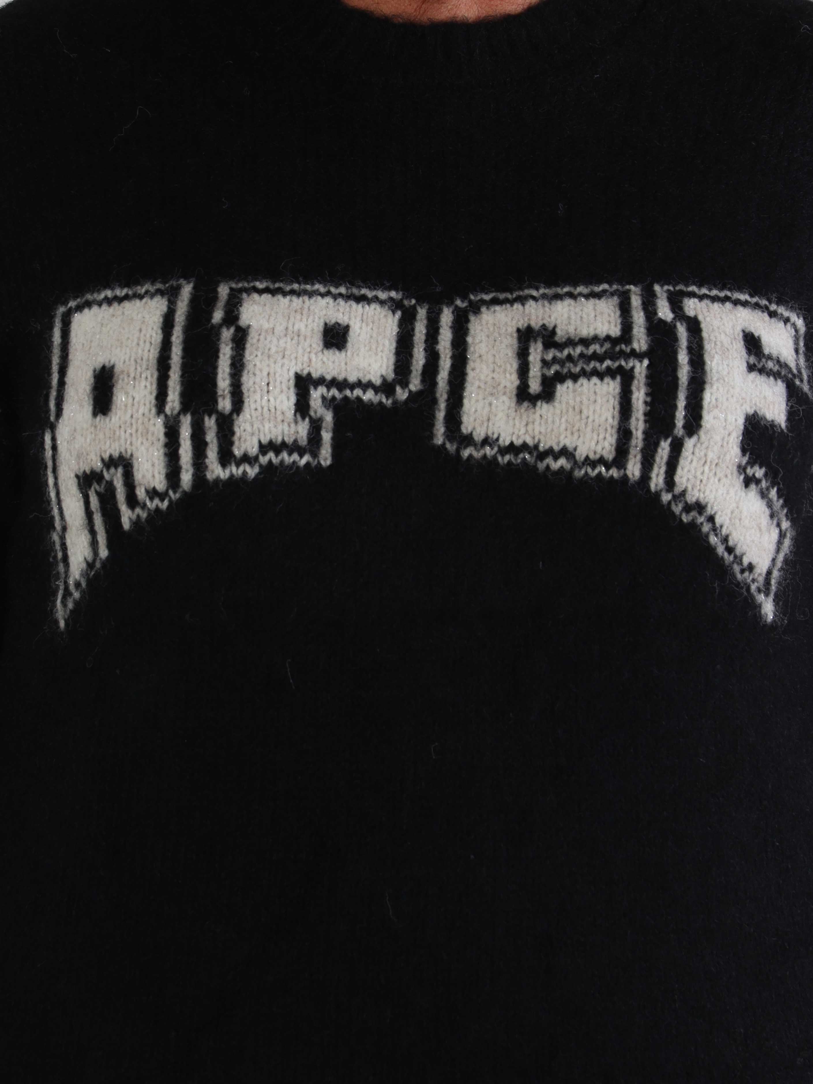 Adira - Blød plus size strik med grafisk logo