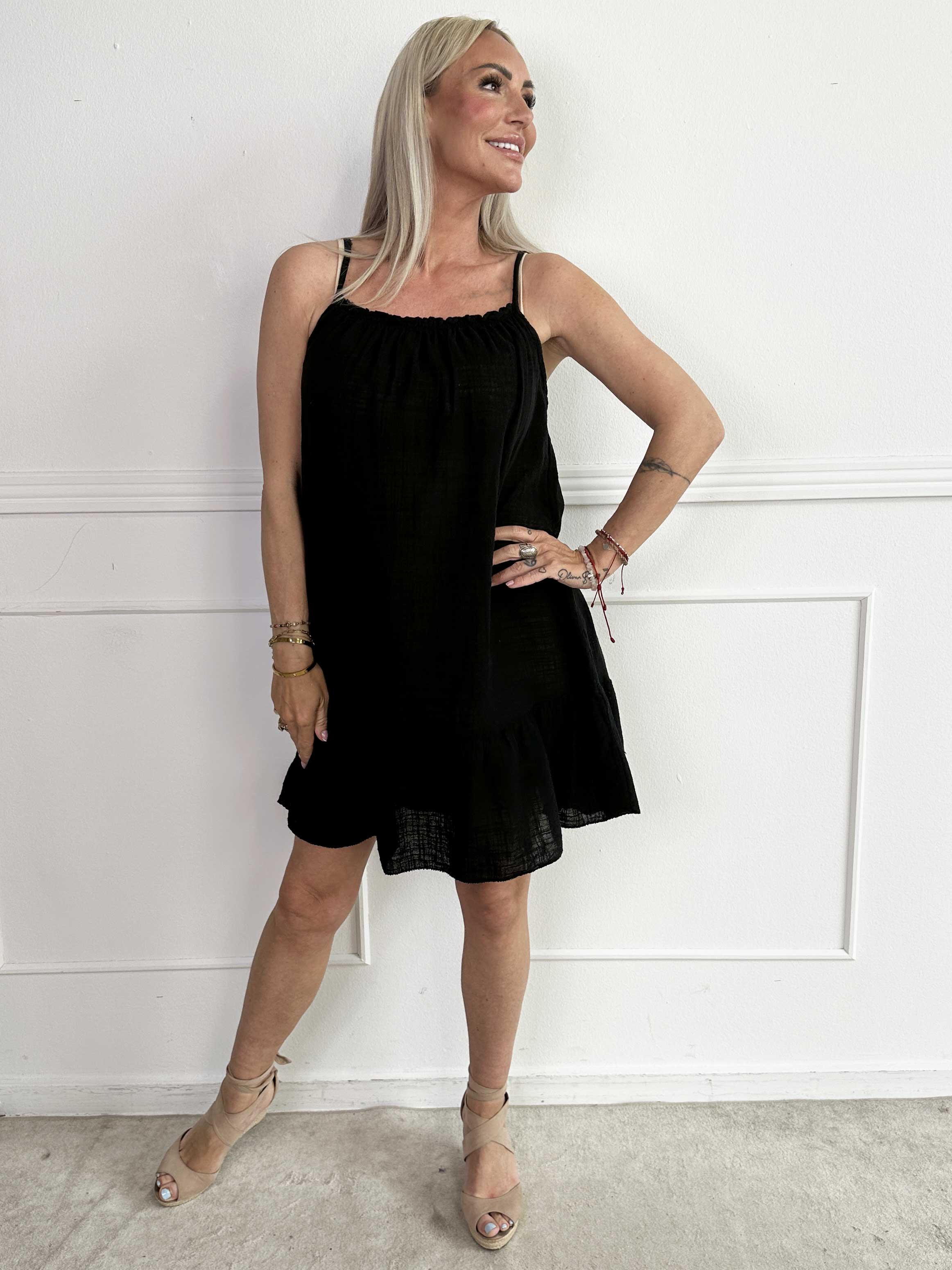 Aegle - Bomulls axelremsklänning i linneliknande material med volangkant