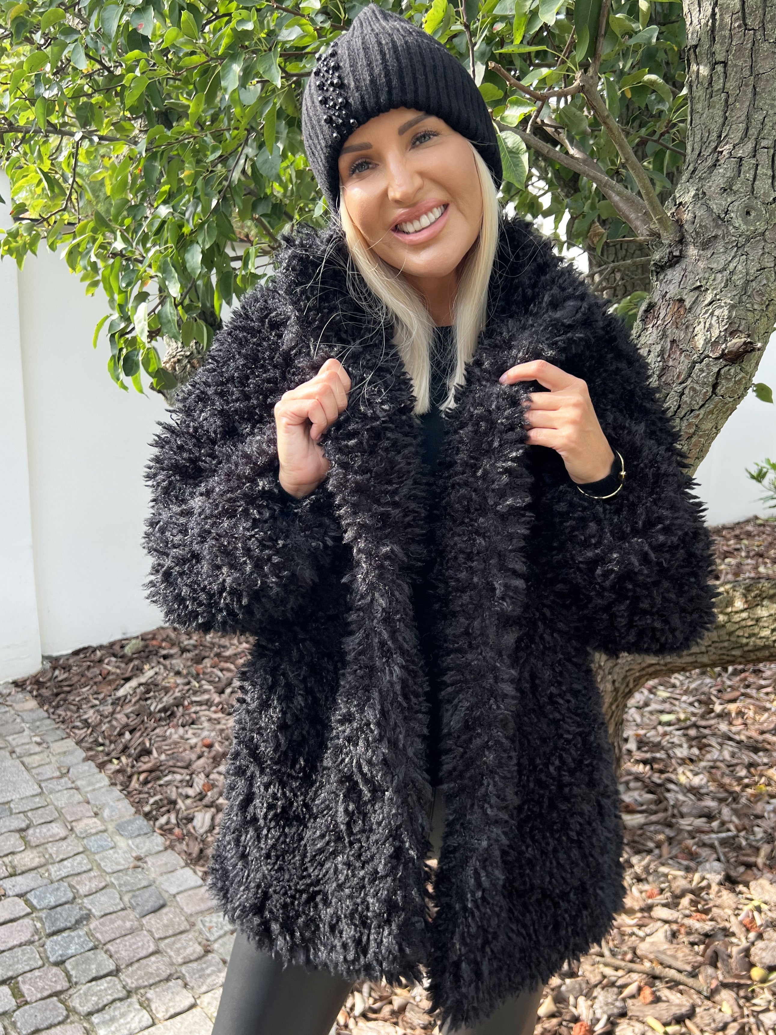 Alma - Jacka i pile med tryckknappar och fickor