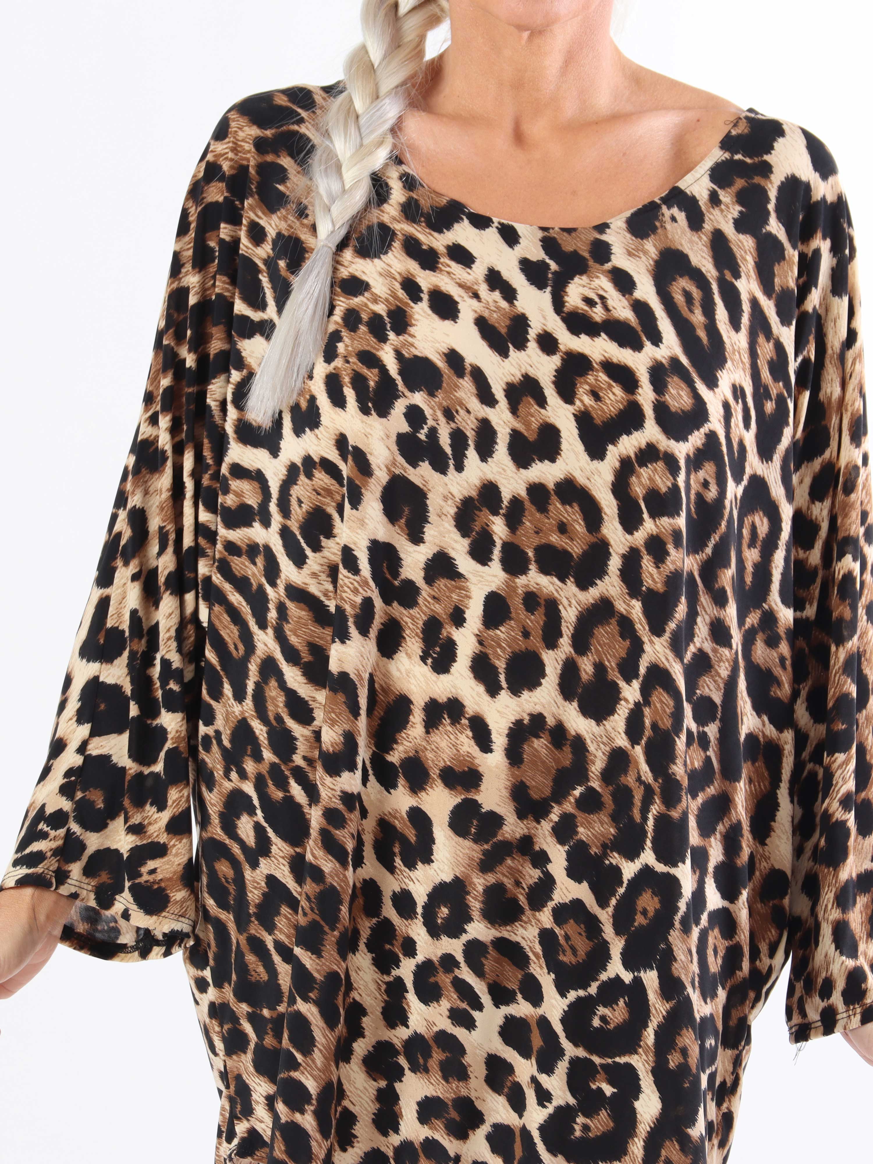 Augustine - Plus size-blus i stretchigt tyg med fladdermusärmar