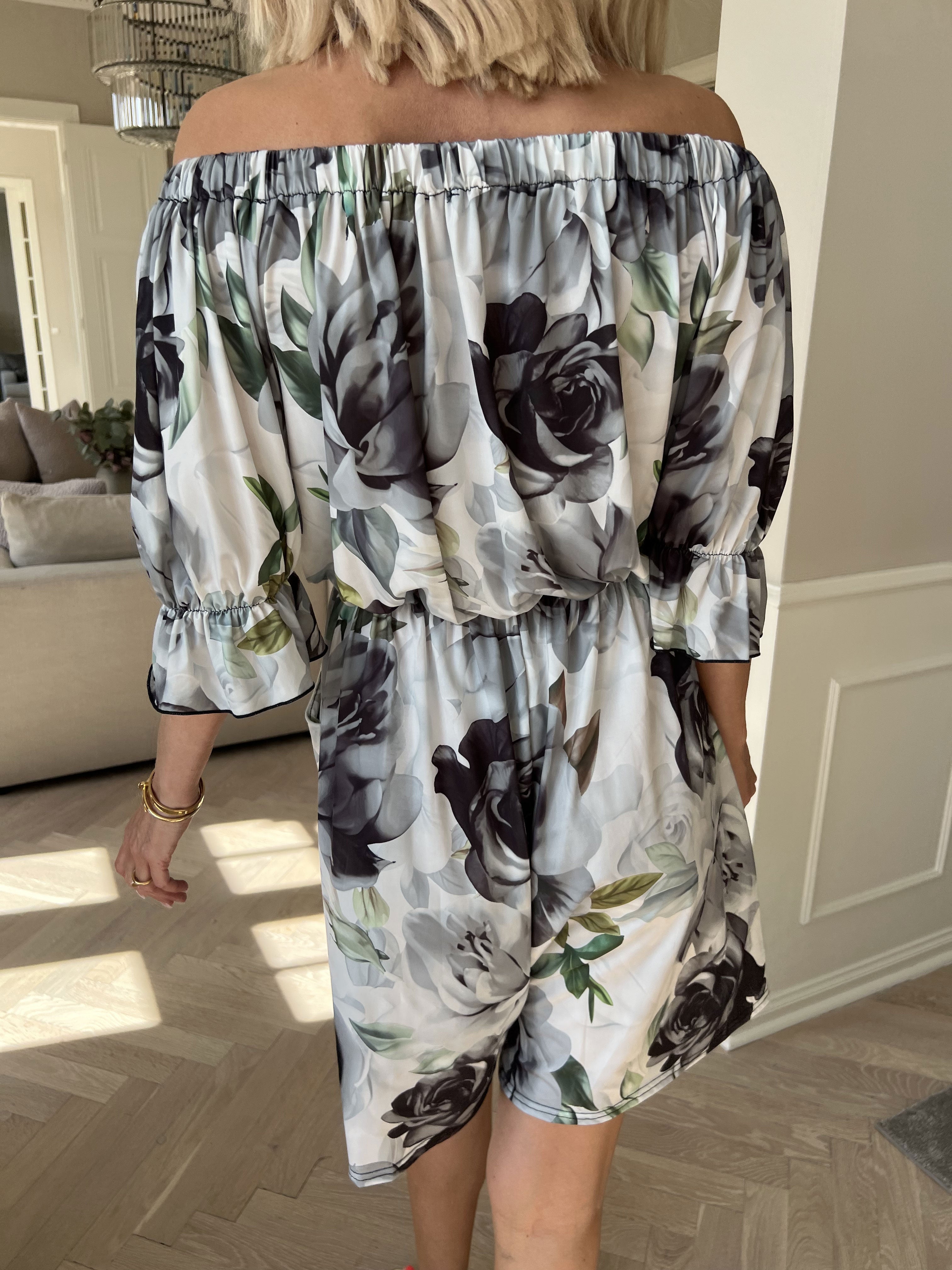 Ayla Playsuit - Elastisk blommig byxdräkt