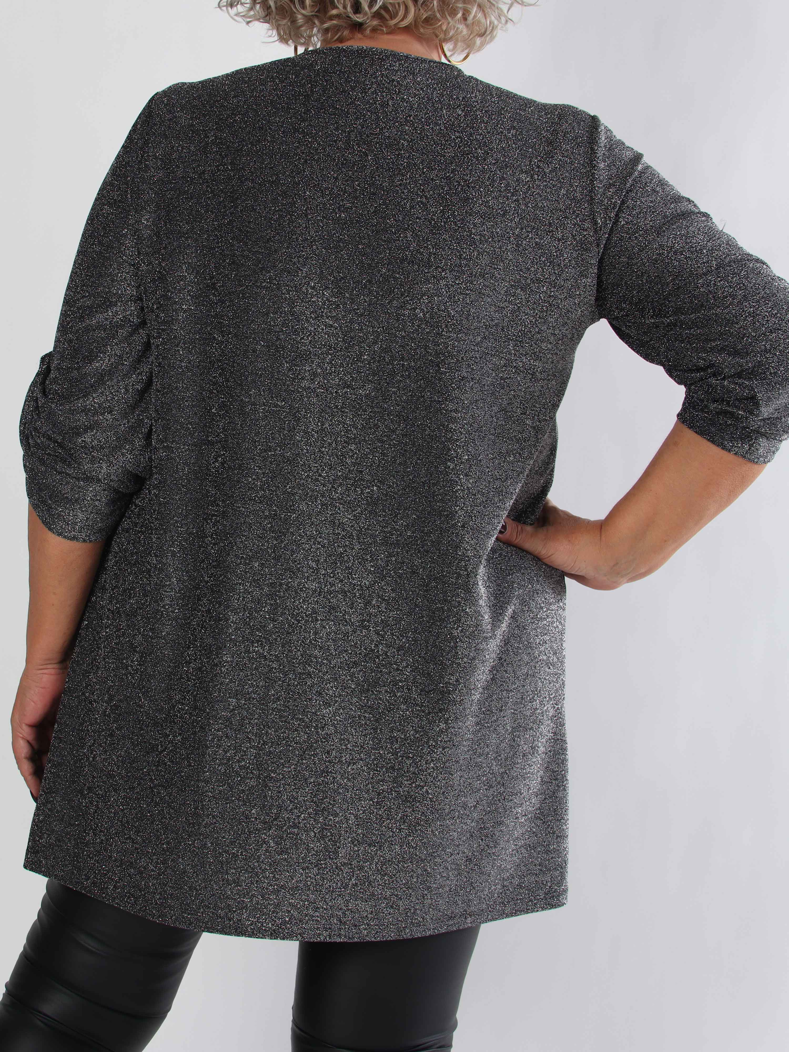 Betty - Söt glittrig plus size tunikaklänning med guldbrosch