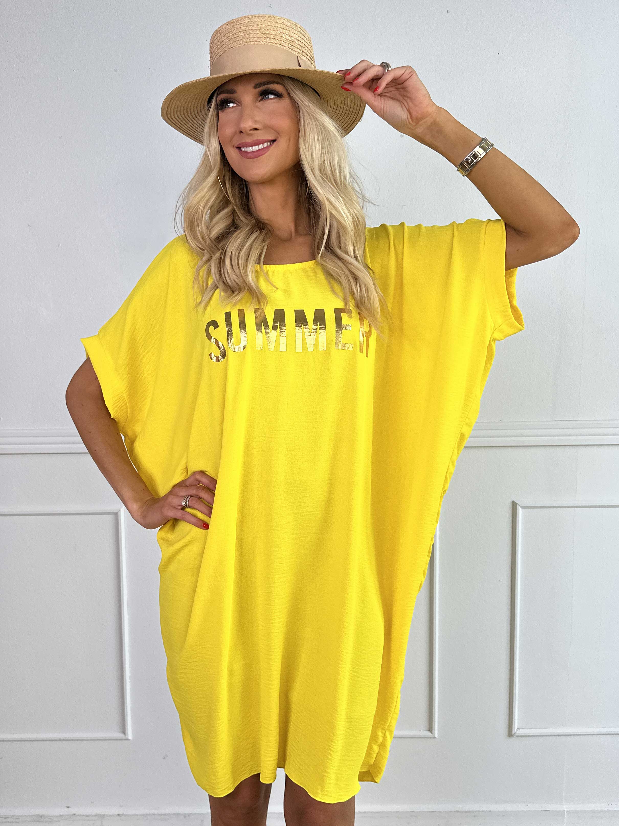 Bine - Söt klänning med lös passform och guldtryck på bröstet