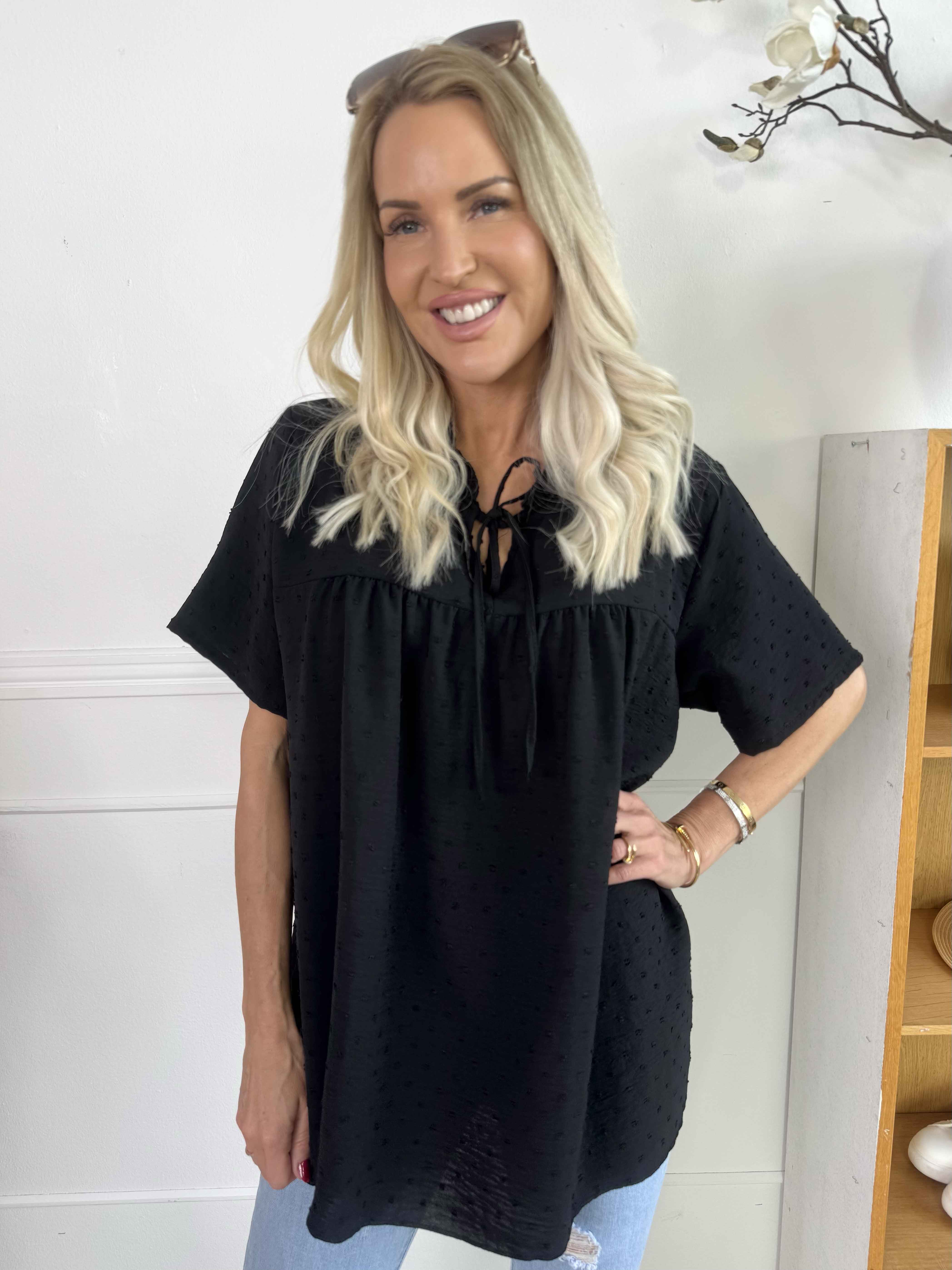 Bloom - Söt tunika med volangkant och rosett