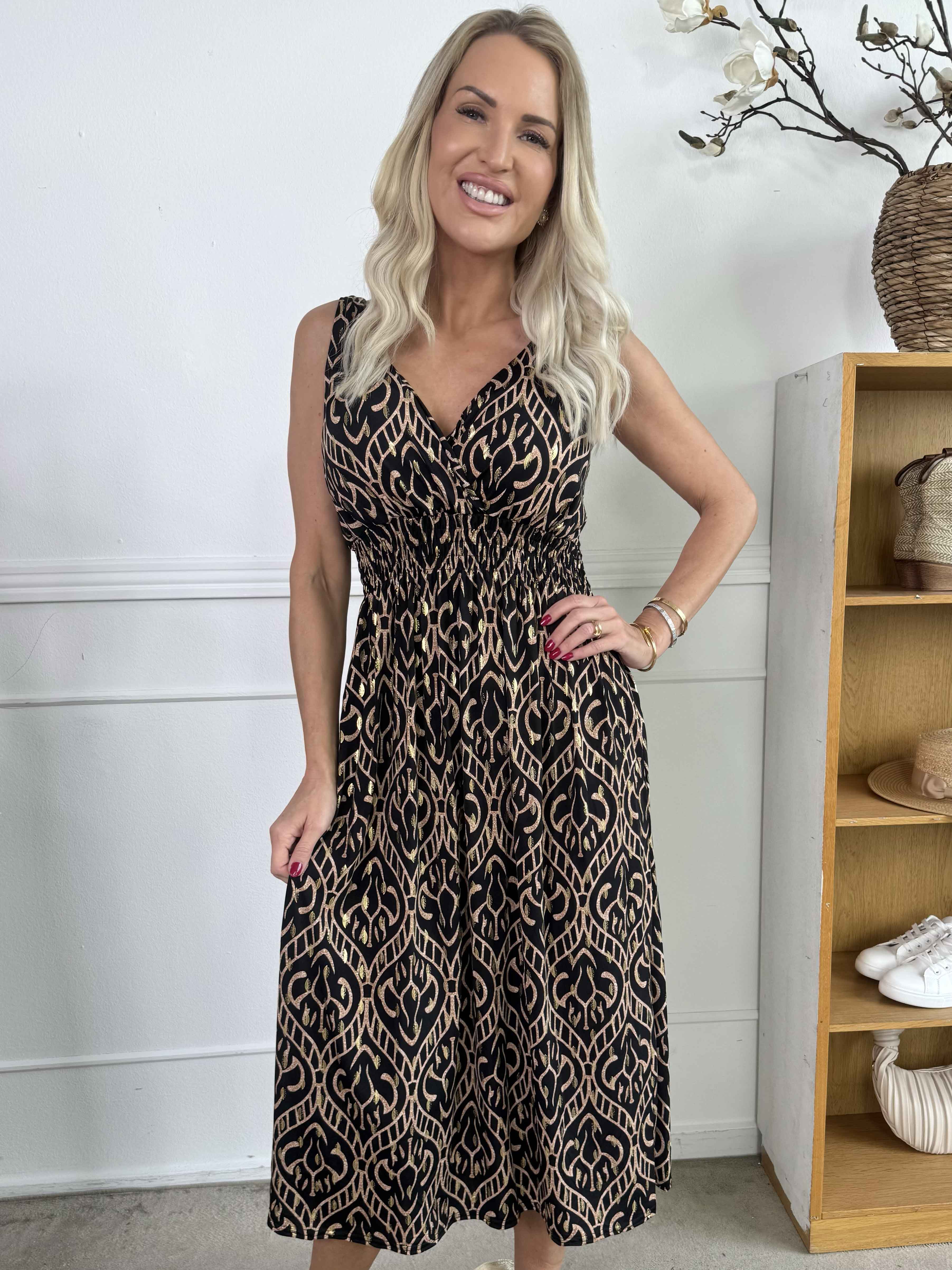 Camille - Axelbandsklänning i elastiskt tyg