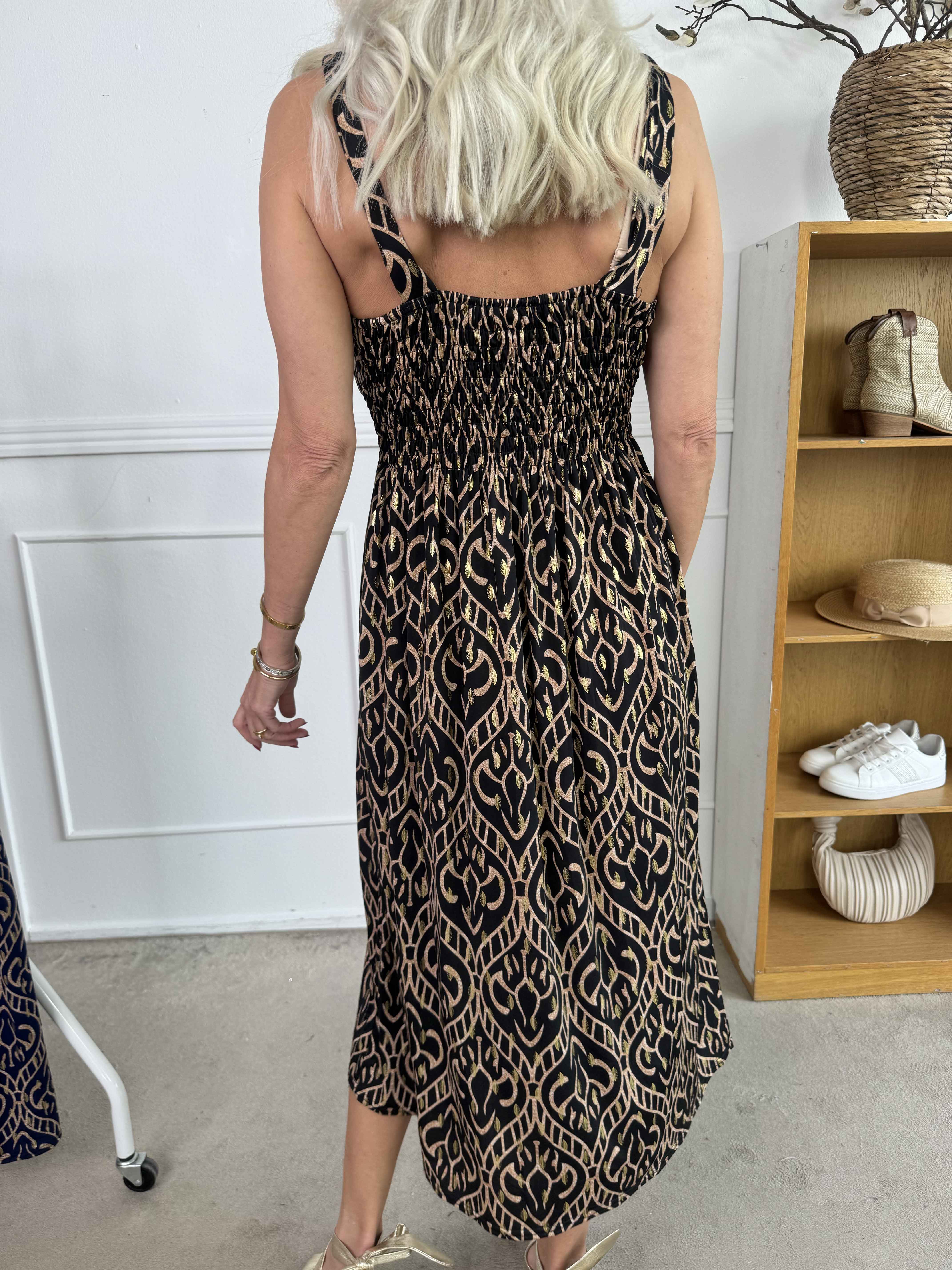 Camille - Axelbandsklänning i elastiskt tyg