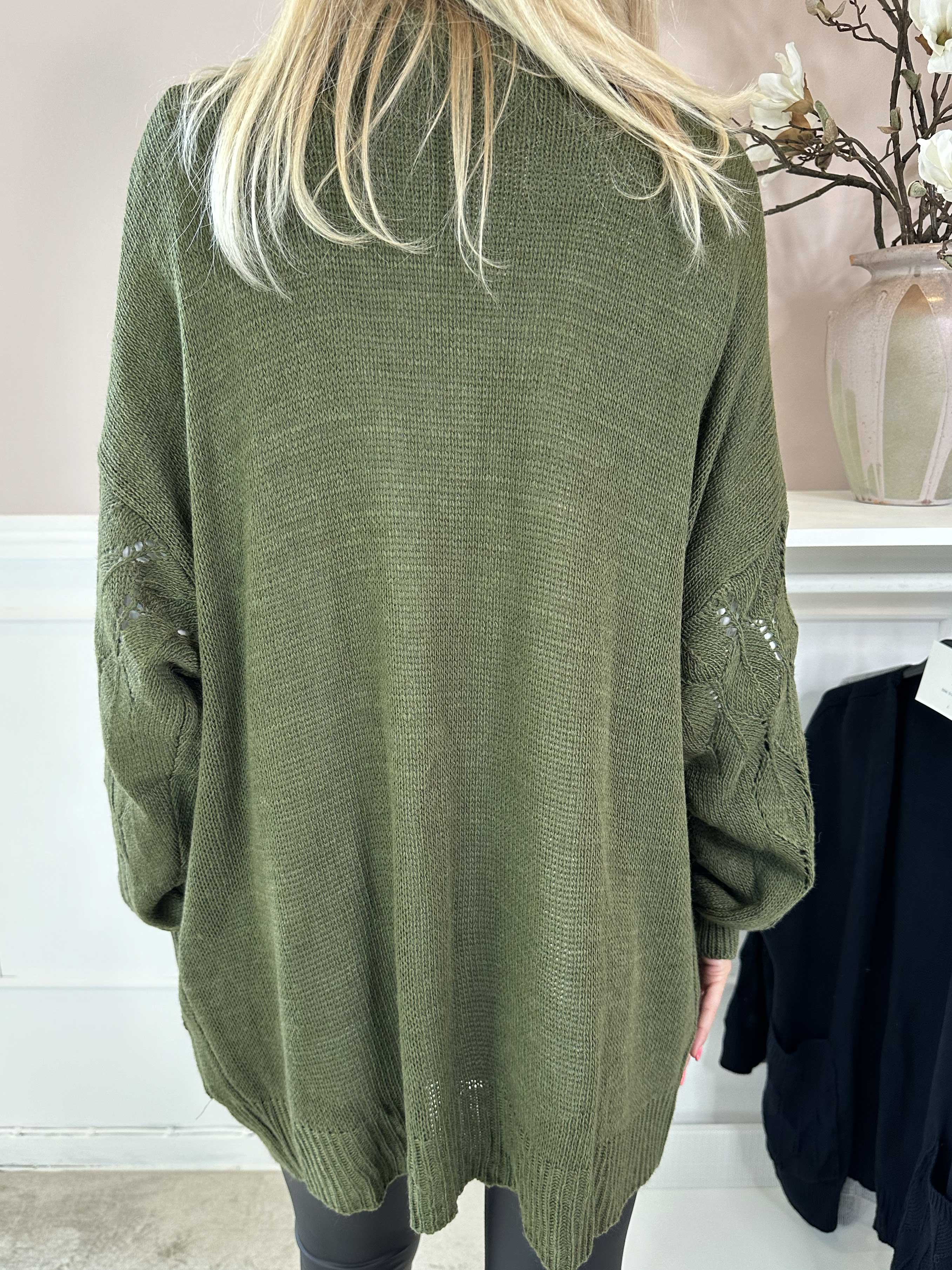 Capri - Stickad kofta med fickor