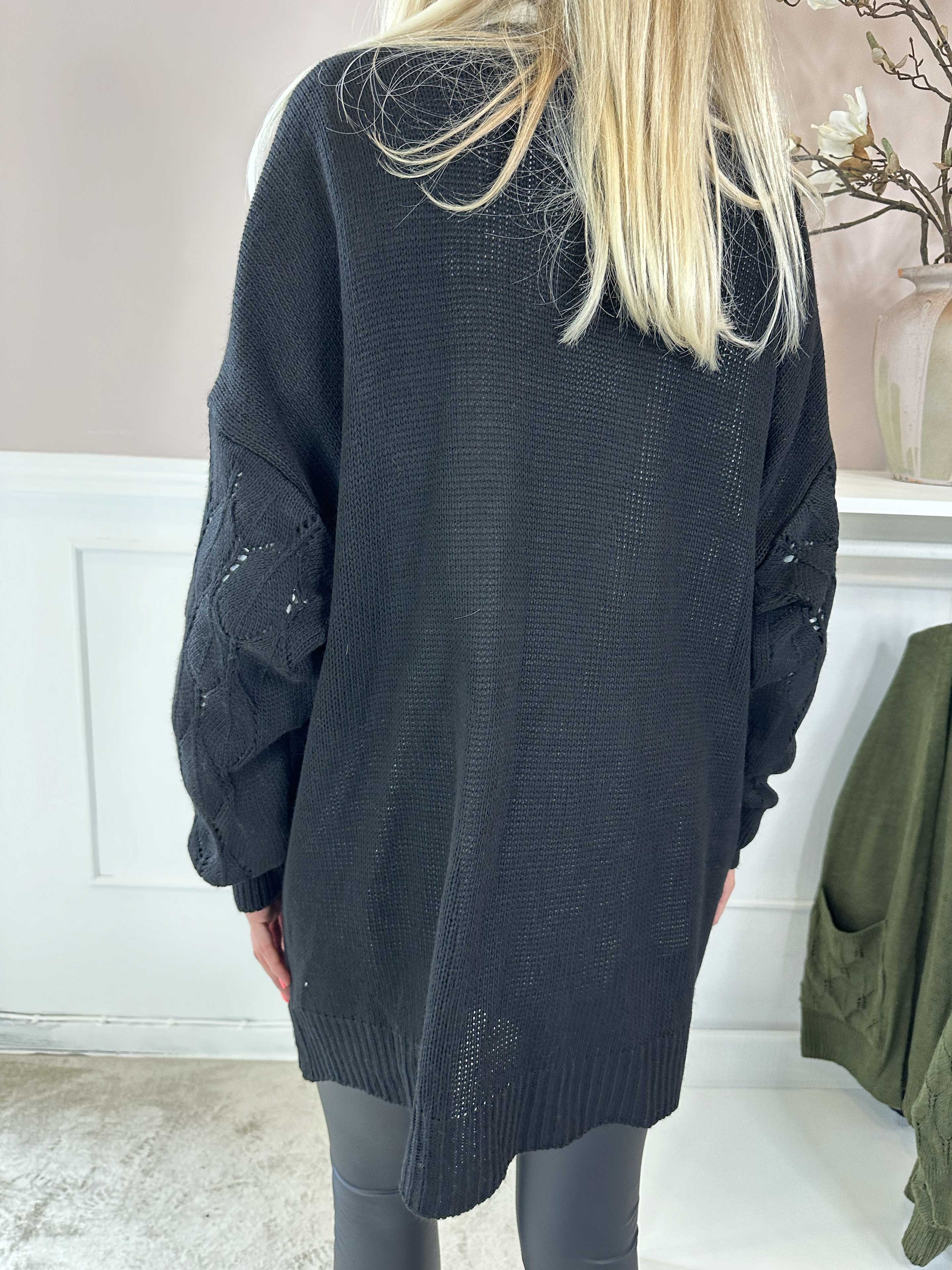 Capri - Stickad kofta med fickor