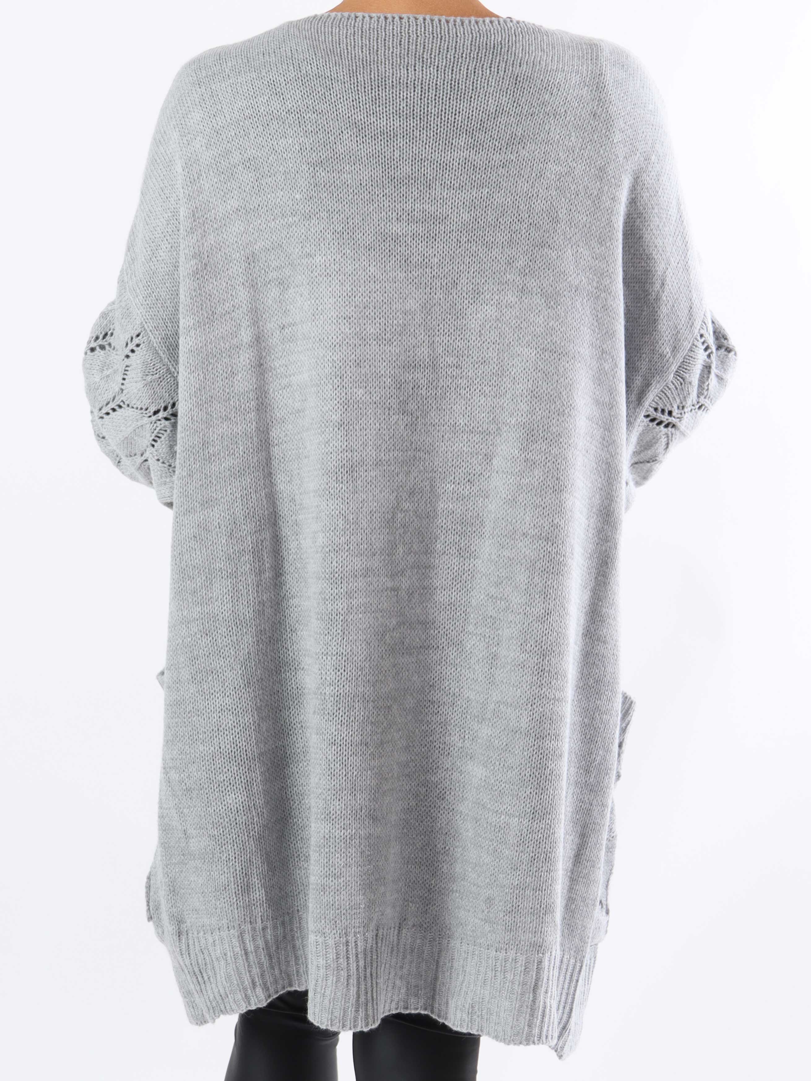 Capri - Stickad kofta i plus size med fickor