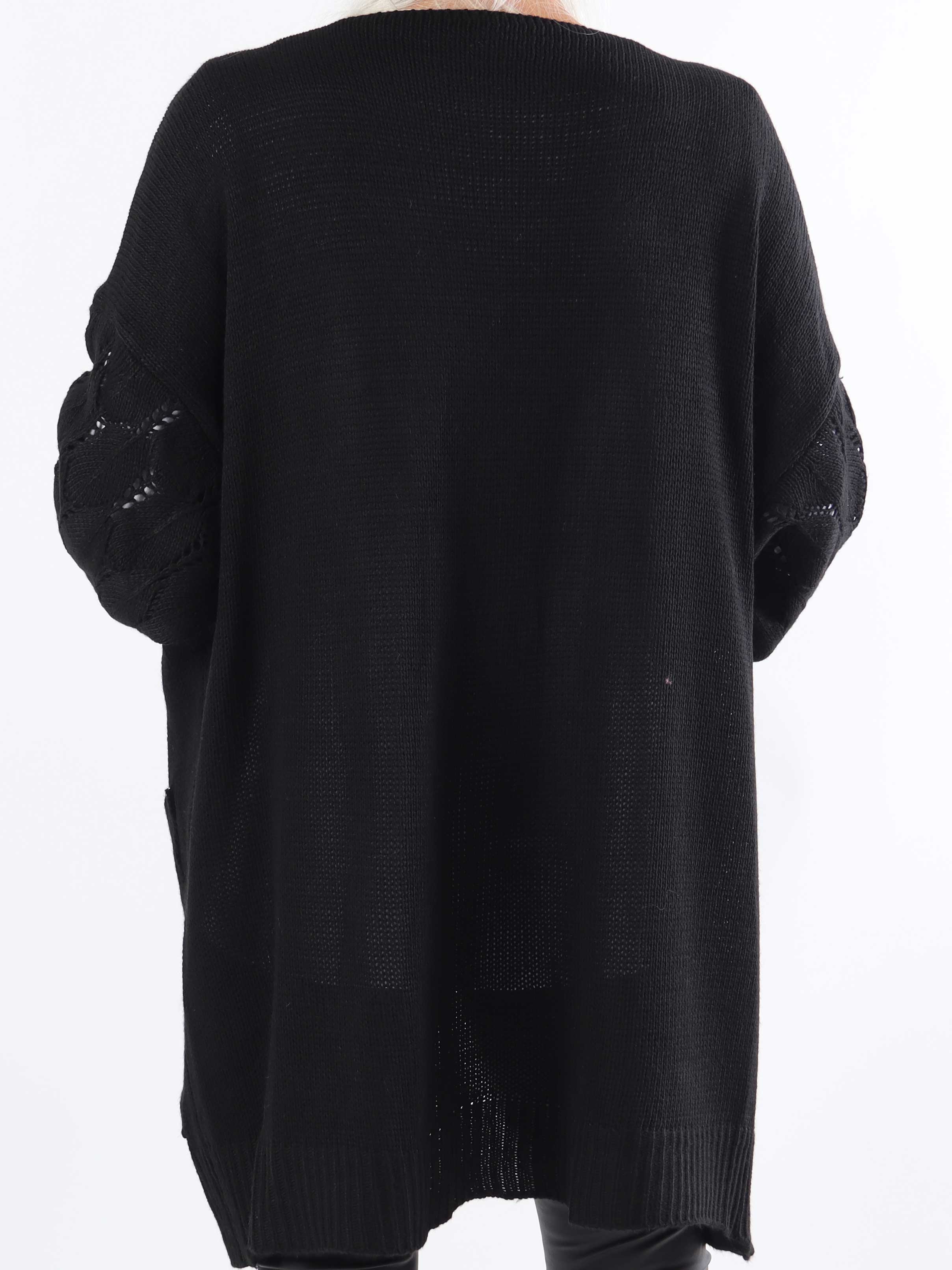 Capri - Stickad kofta i plus size med fickor