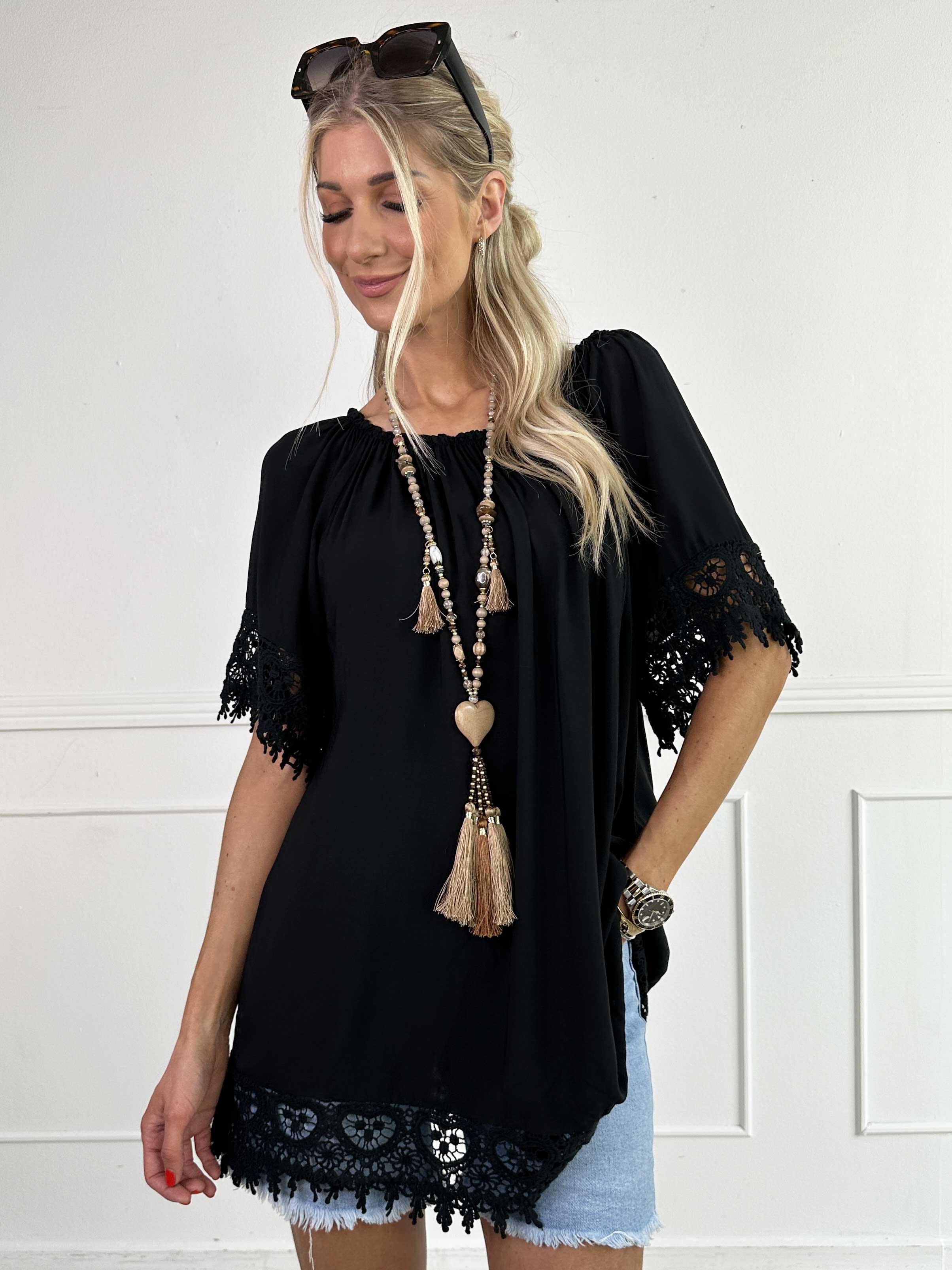 Carnelia - Söt tunikaklänning i viskos med broderade kanter