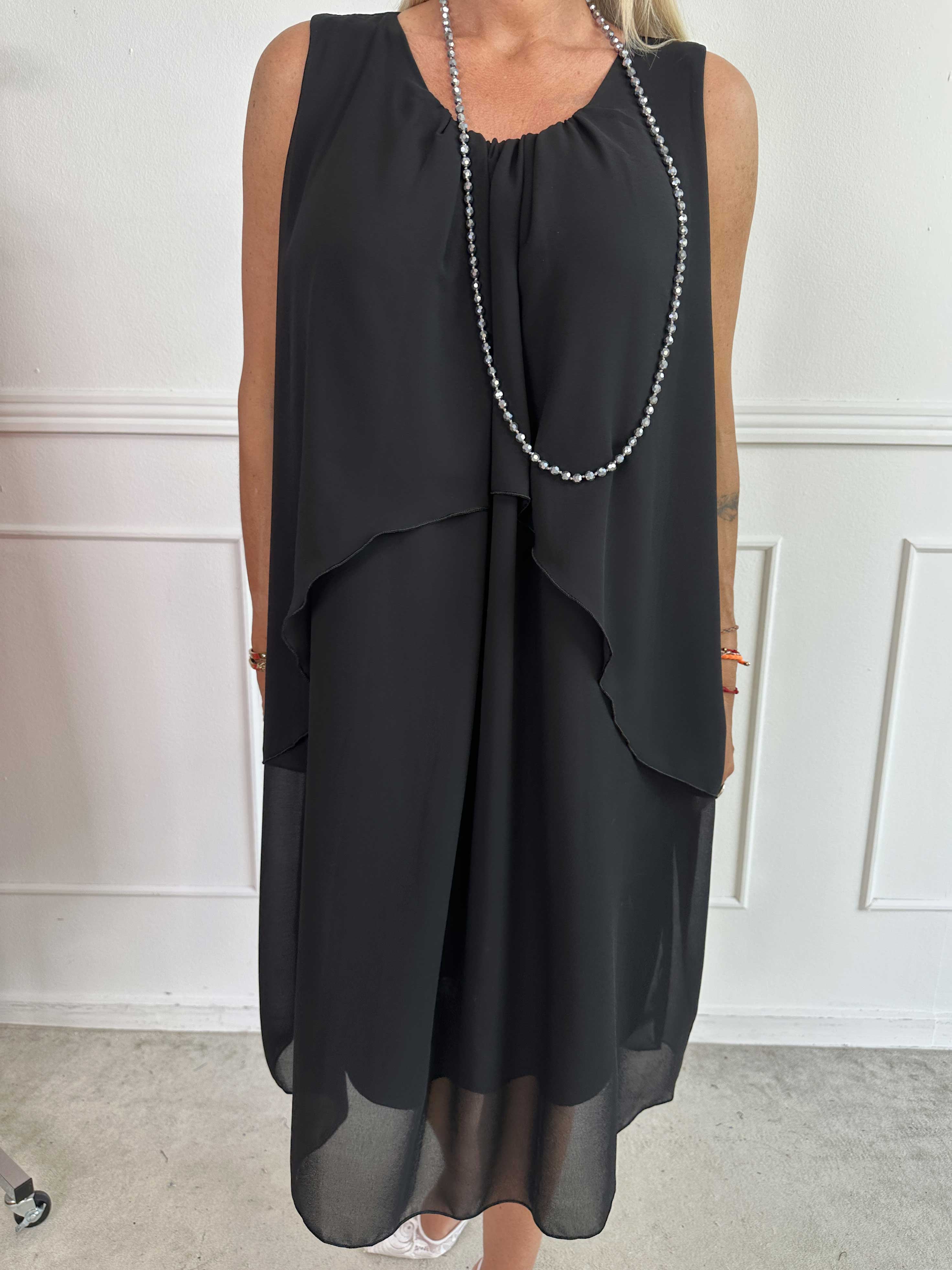 Chanelli - Sød kjole med chiffon flæselag