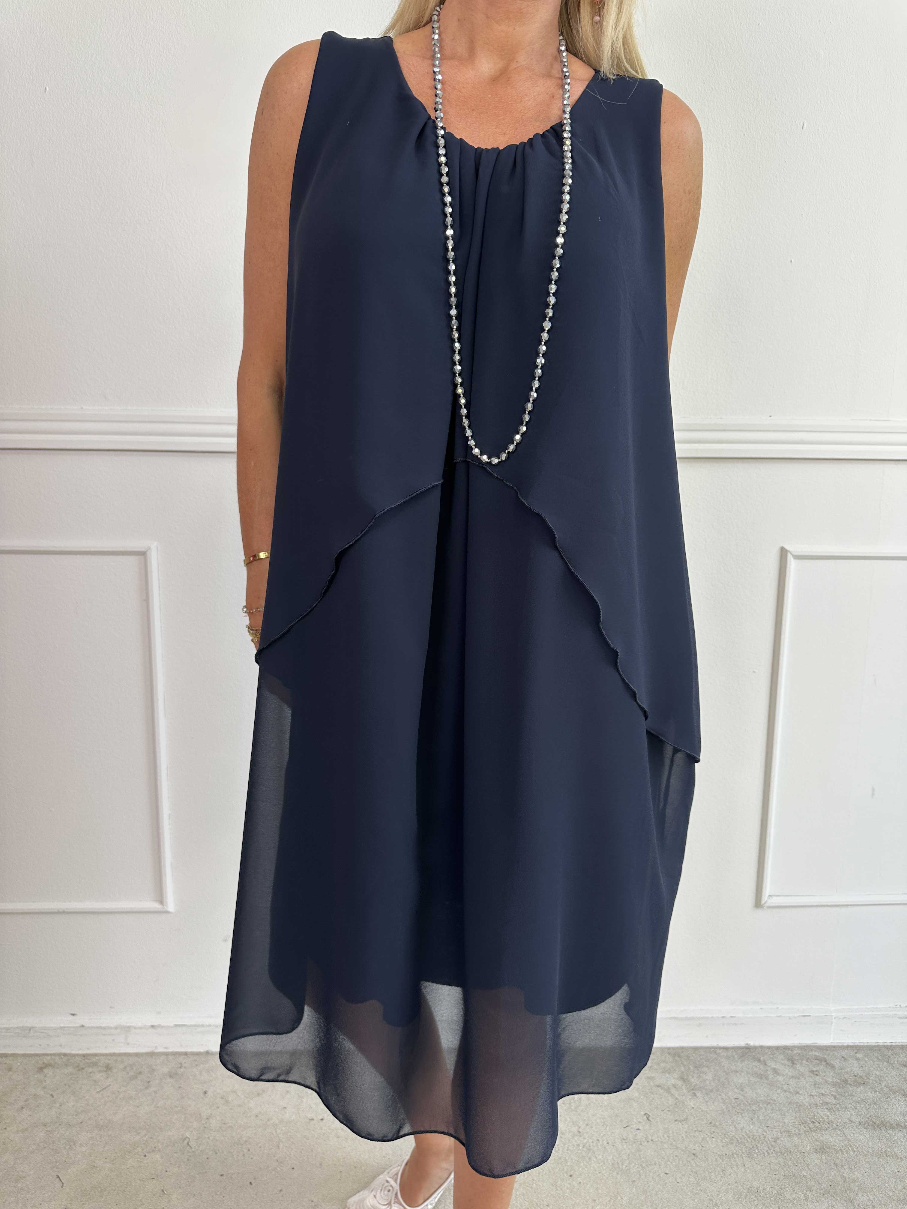 Chanelli - Sød kjole med chiffon flæselag