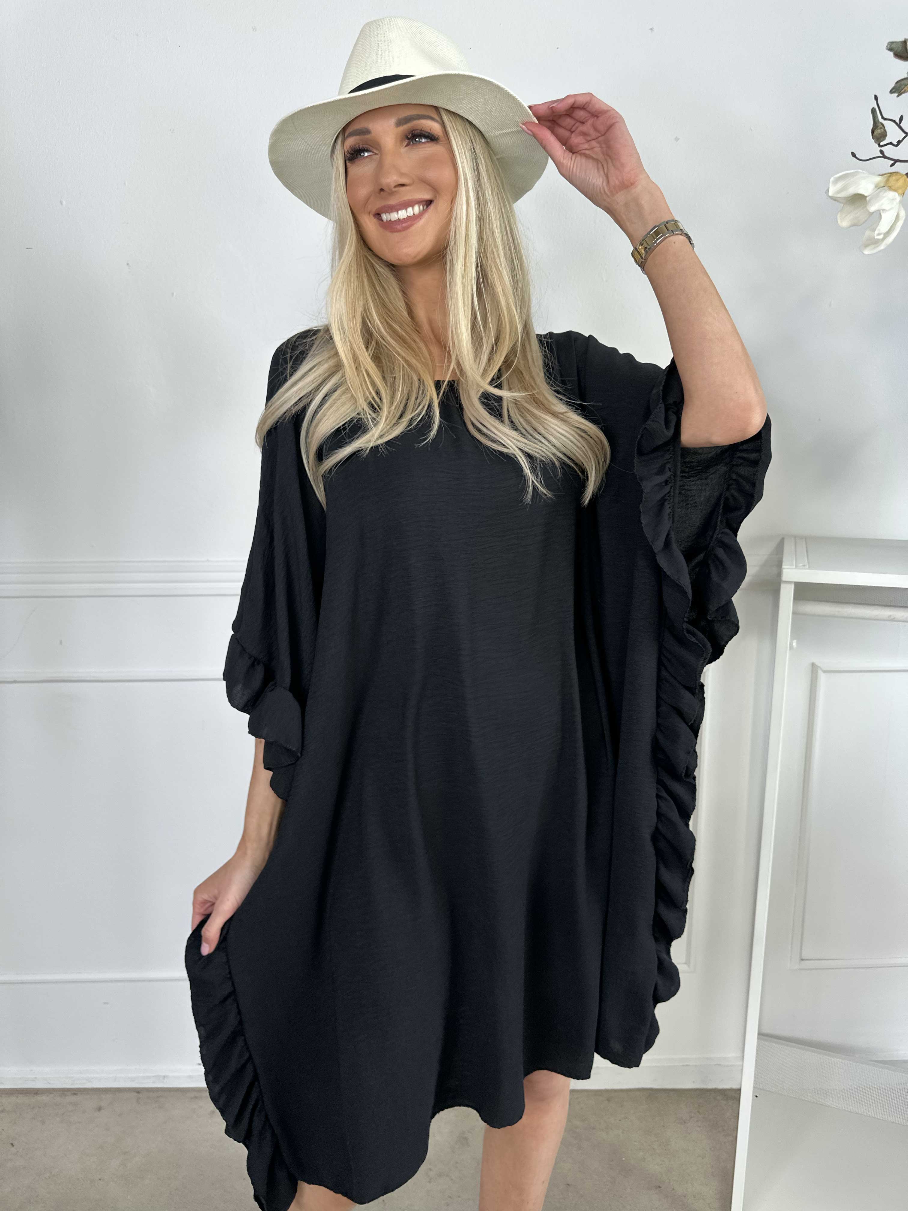 Cille - Söt tunika med volanger i sidorna