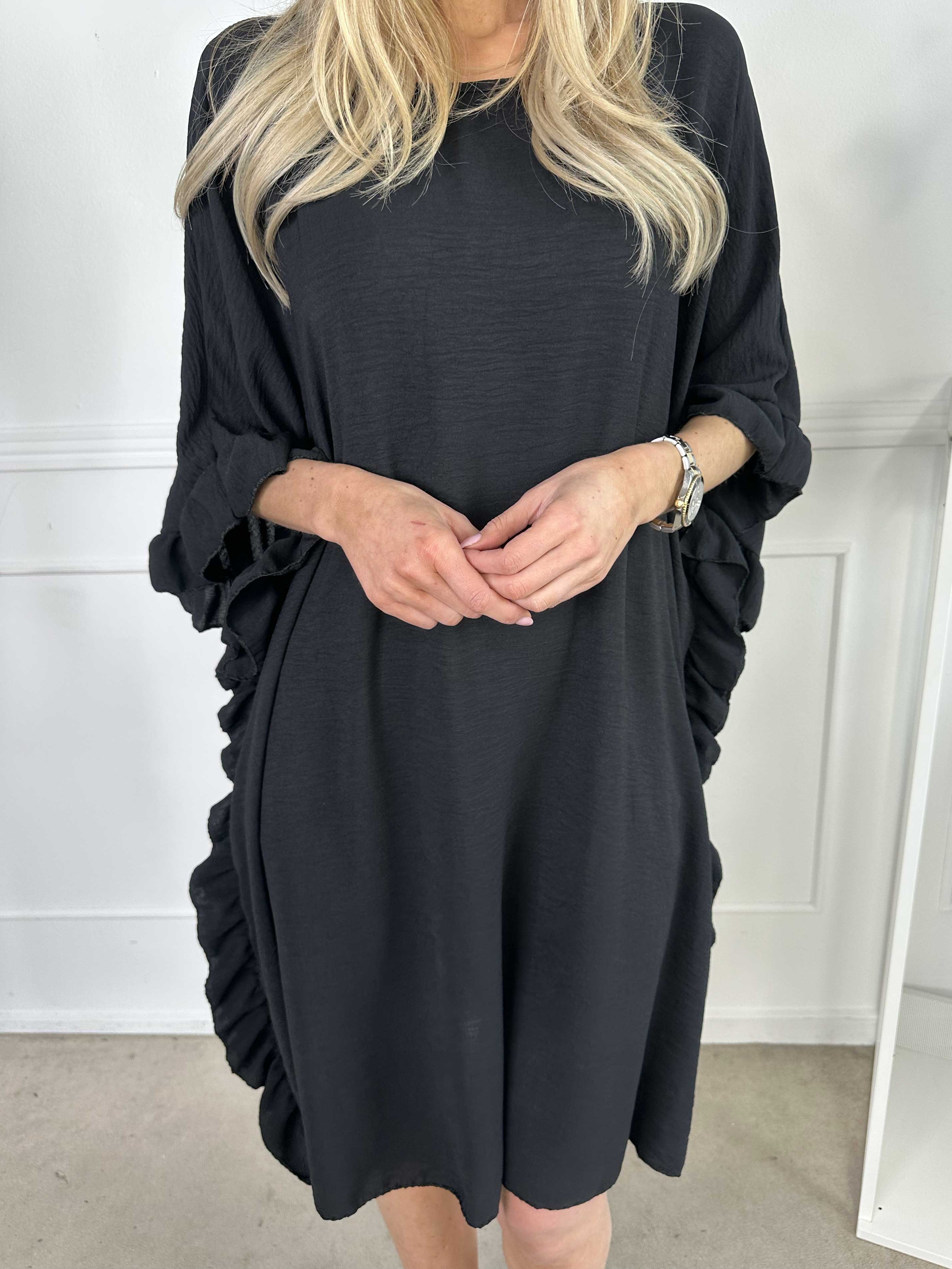 Cille - Söt tunika med volanger i sidorna