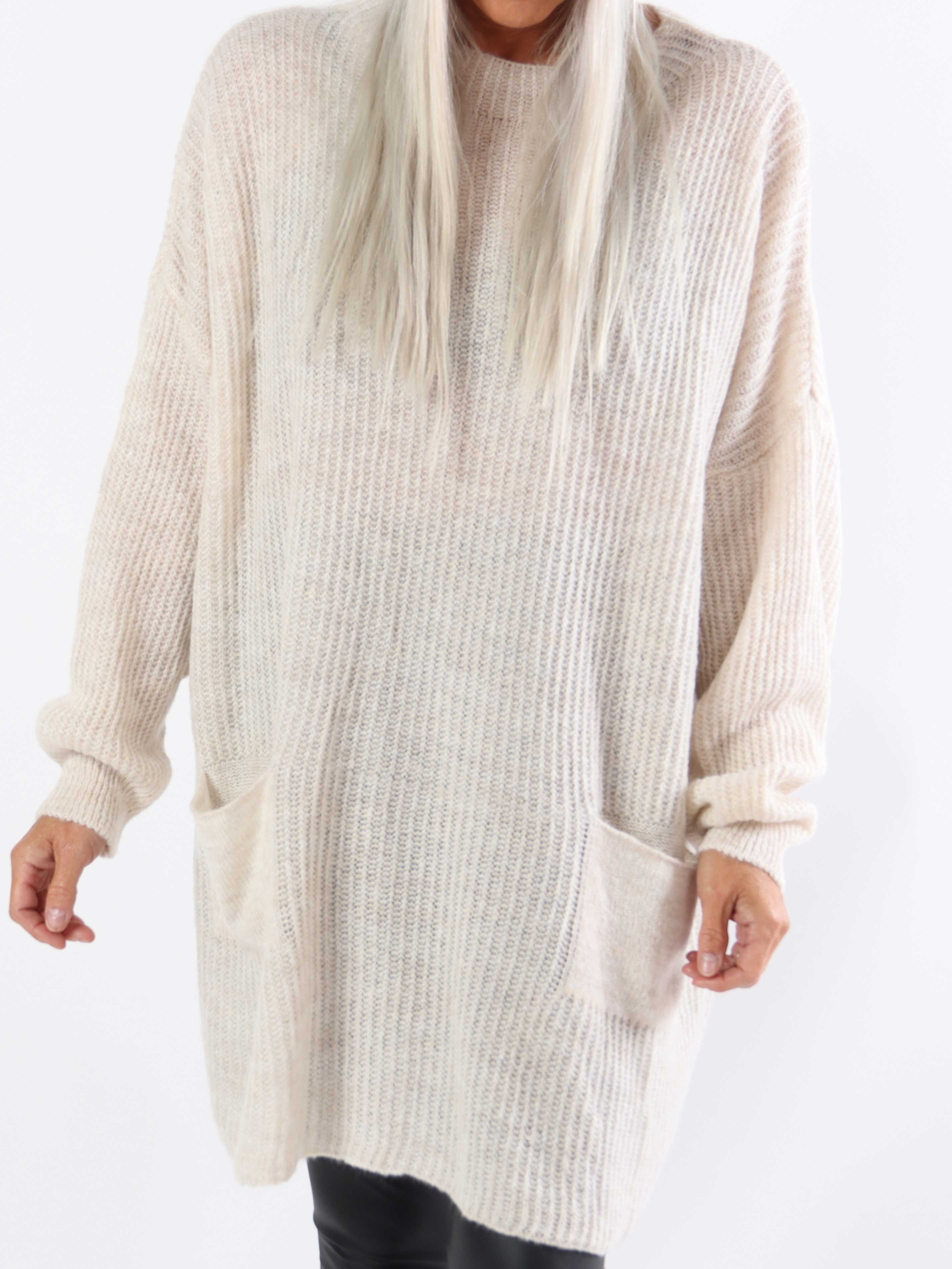 Dakota - Lång stickad blus i plus size med fickor