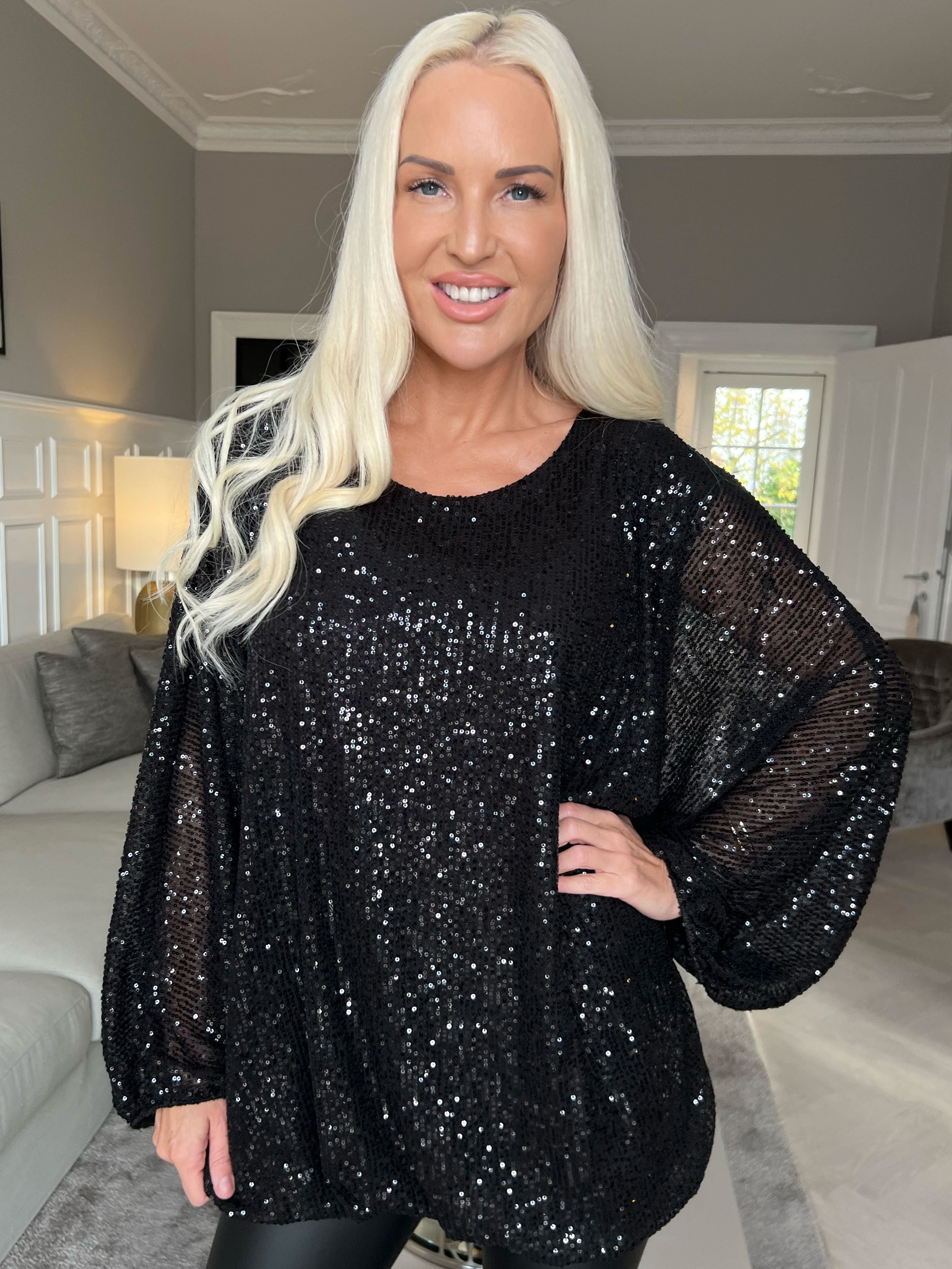 Destiny - Paljettblus med fladdermusärmar