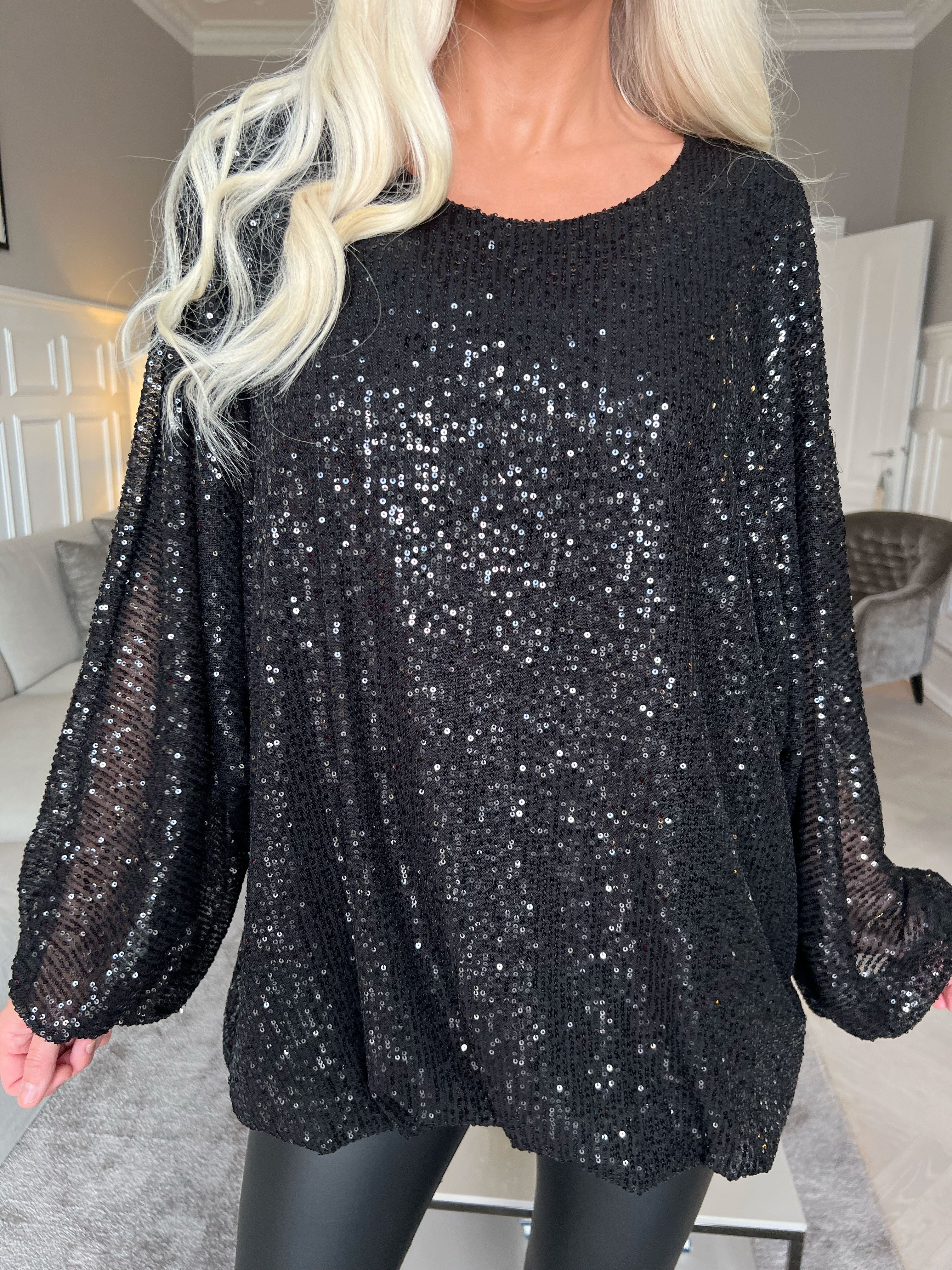 Destiny - Paljettblus med fladdermusärmar