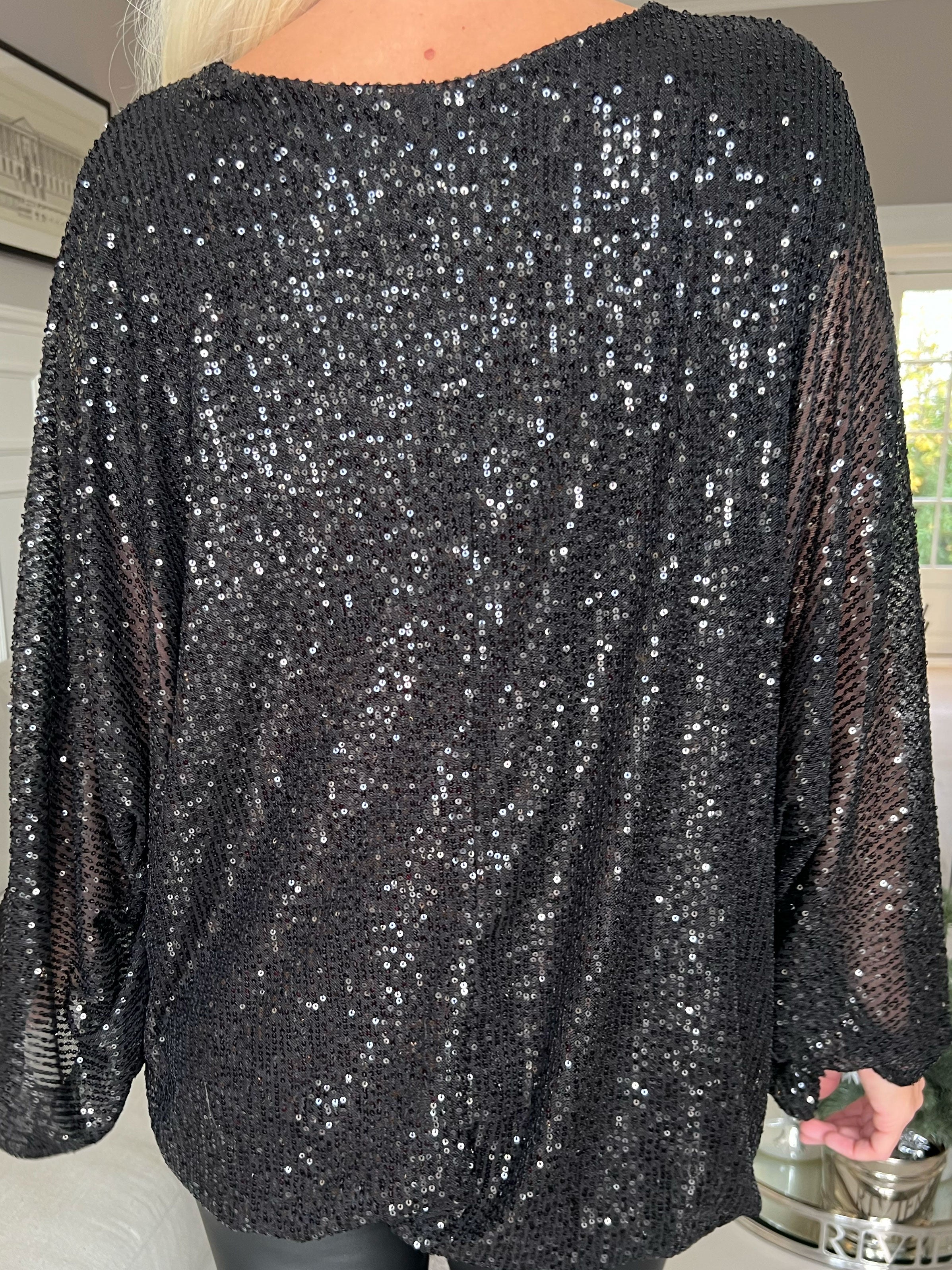 Destiny - Paljettblus med fladdermusärmar