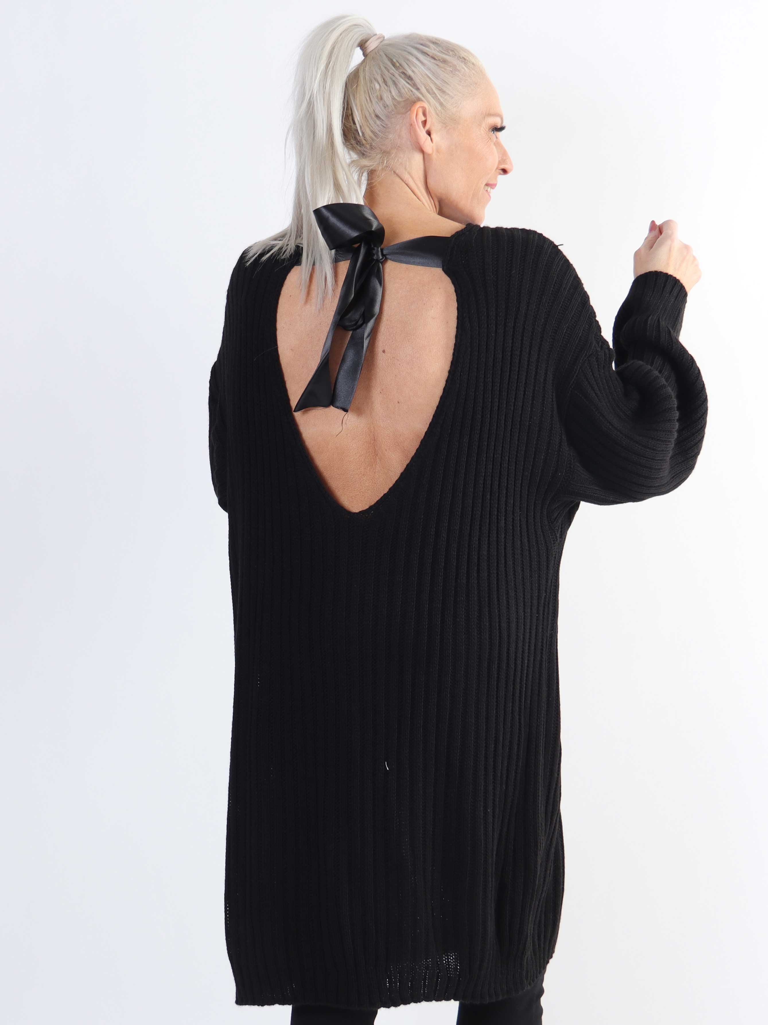 Dica - Stickad plus size klänning med rosett i ryggen