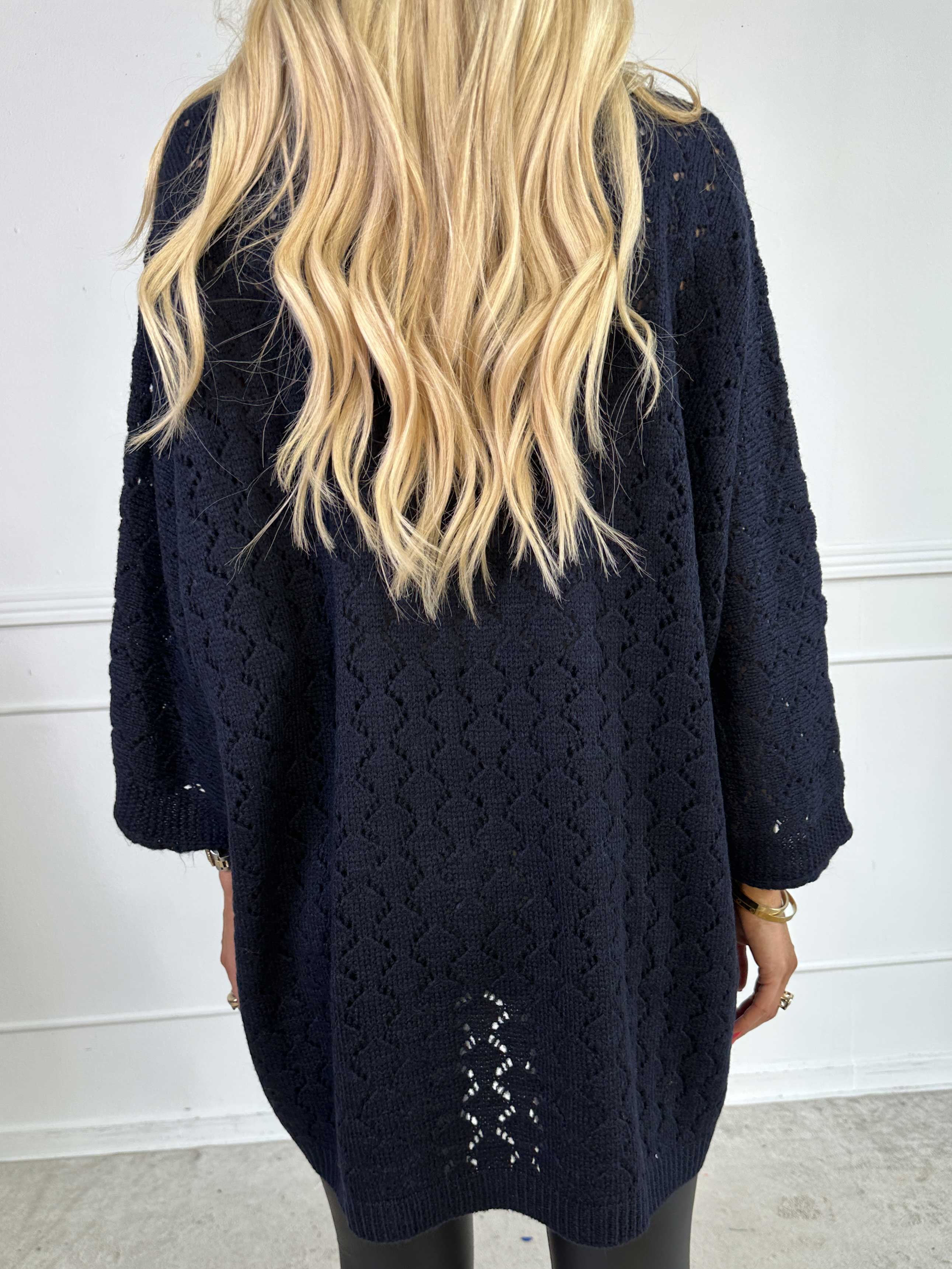 Disa - Stickad tröja med fint hålmönster