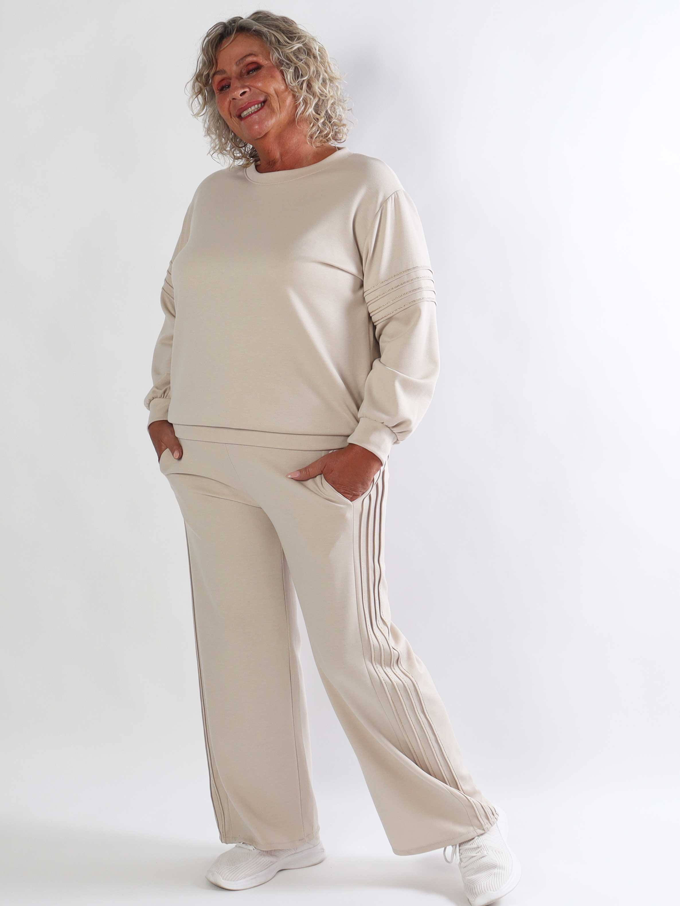 Dream – Mjukt plus size träningsoverallset i viskos med eleganta gulddetaljer