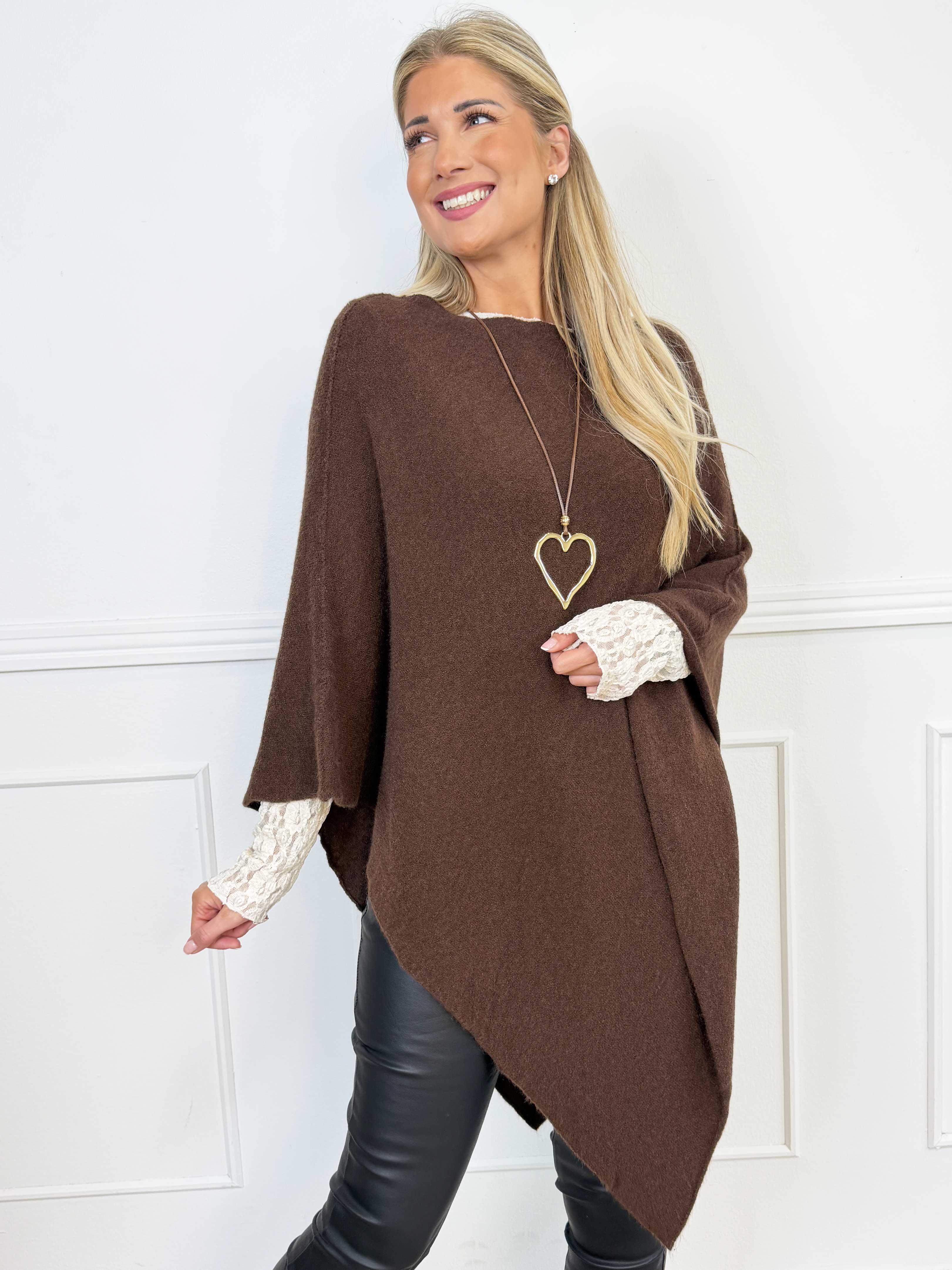 Duff - Söt och elegant poncho i en enkel, enfärgad design och snygg trekantsform