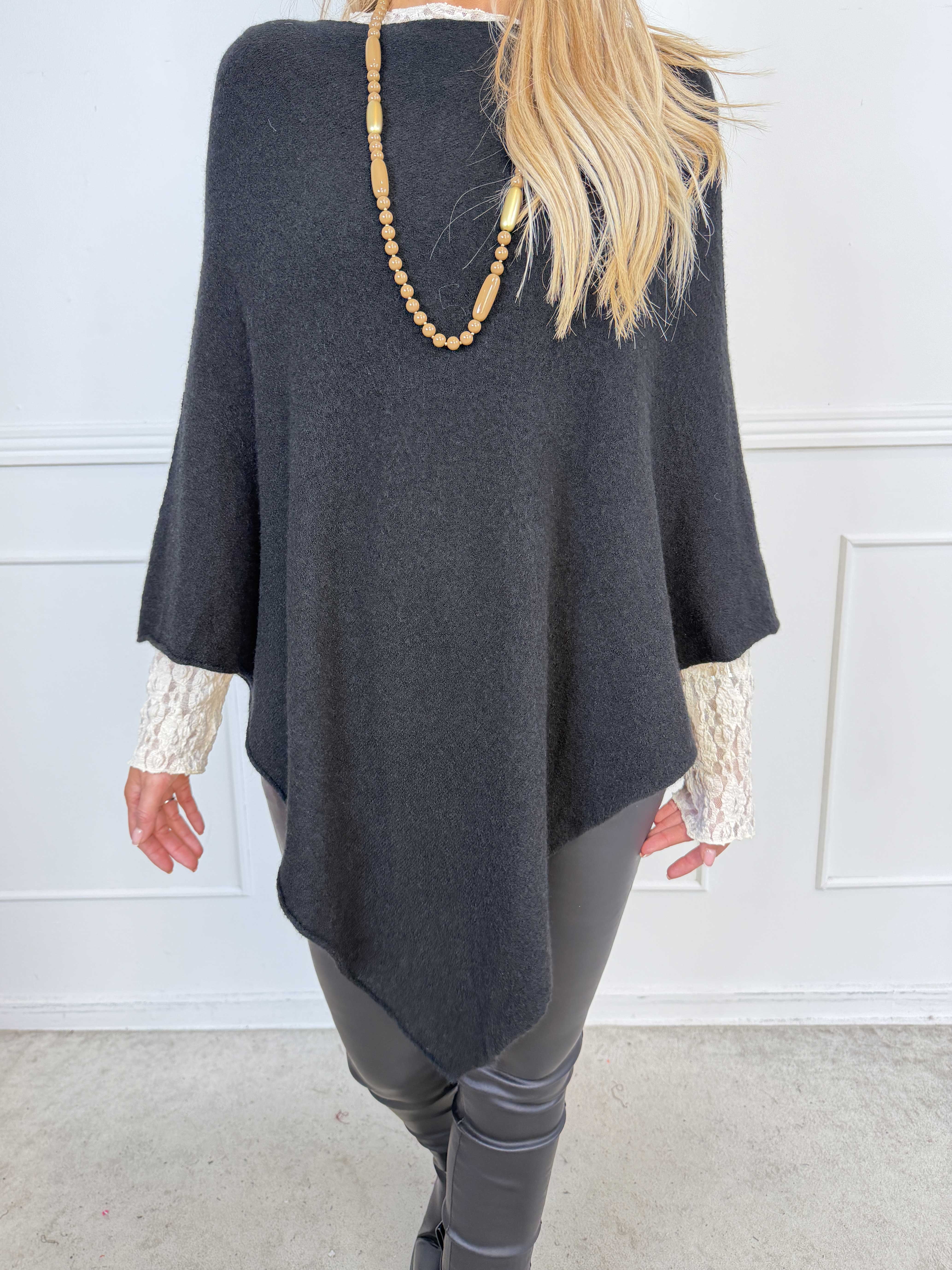 Duff - Söt och elegant poncho i en enkel, enfärgad design och snygg trekantsform