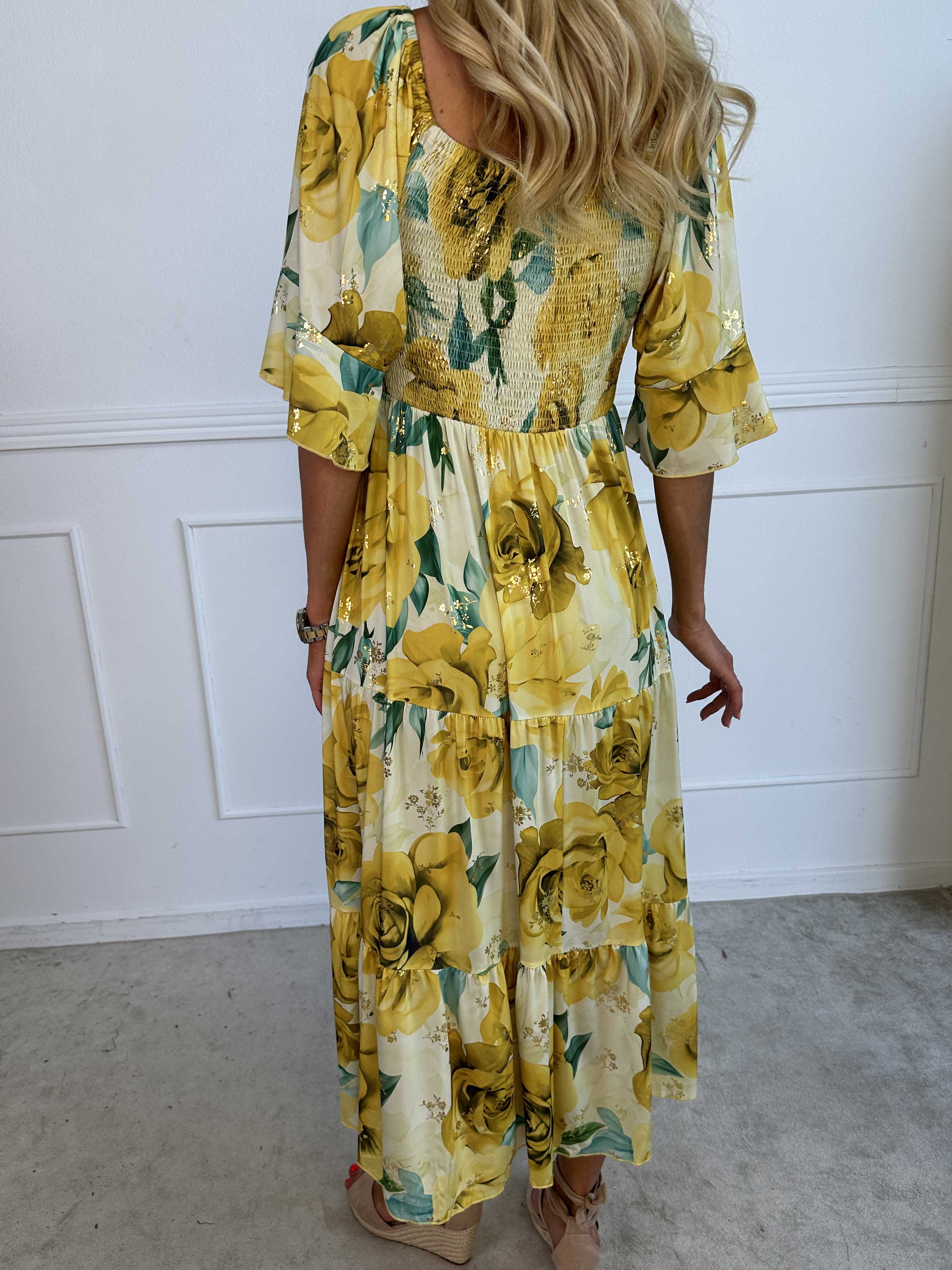 Elna Flower - Blommig elastisk klänning med resår över bysten