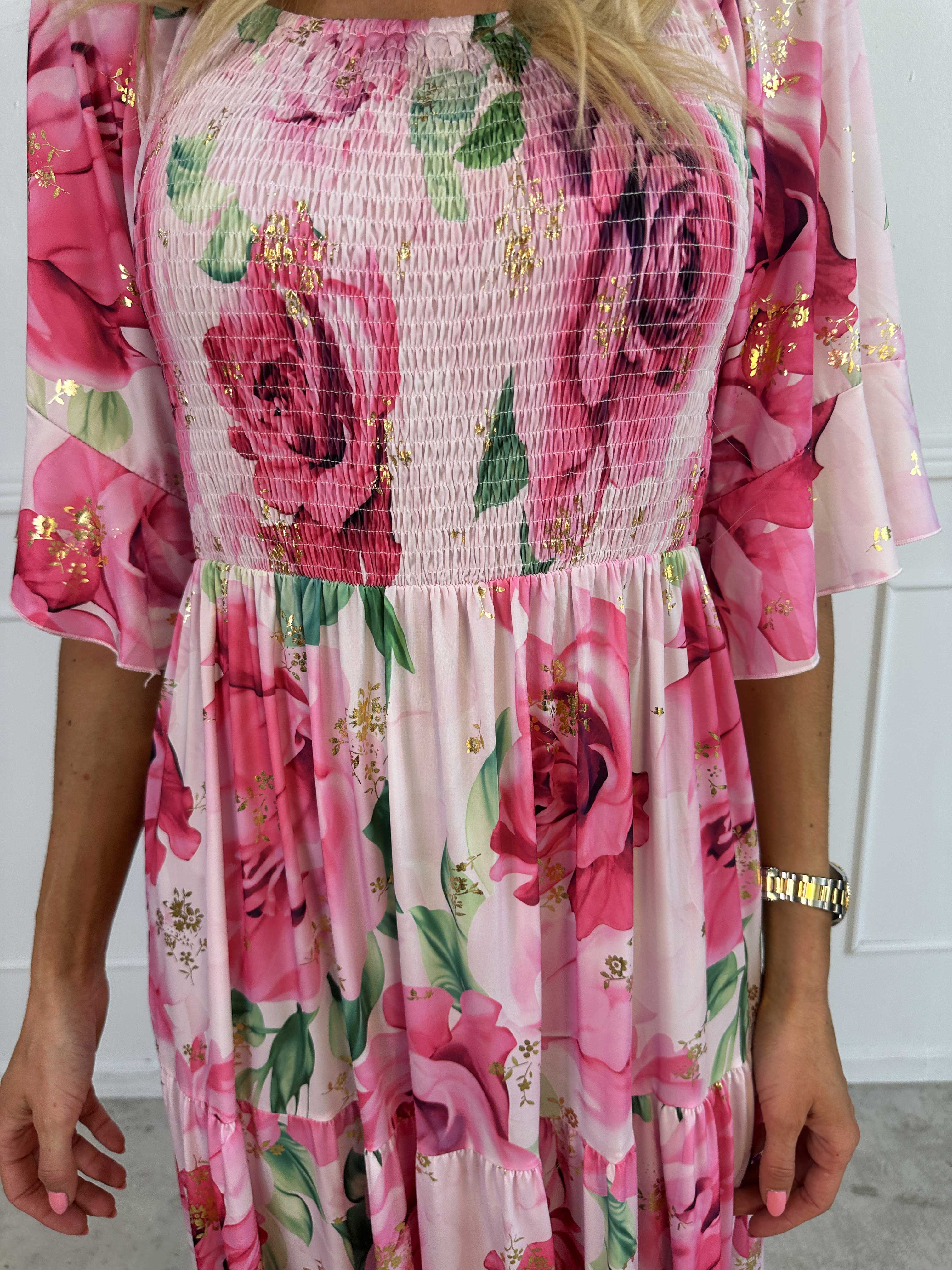 Elna Flower - Blommig elastisk klänning med resår över bysten