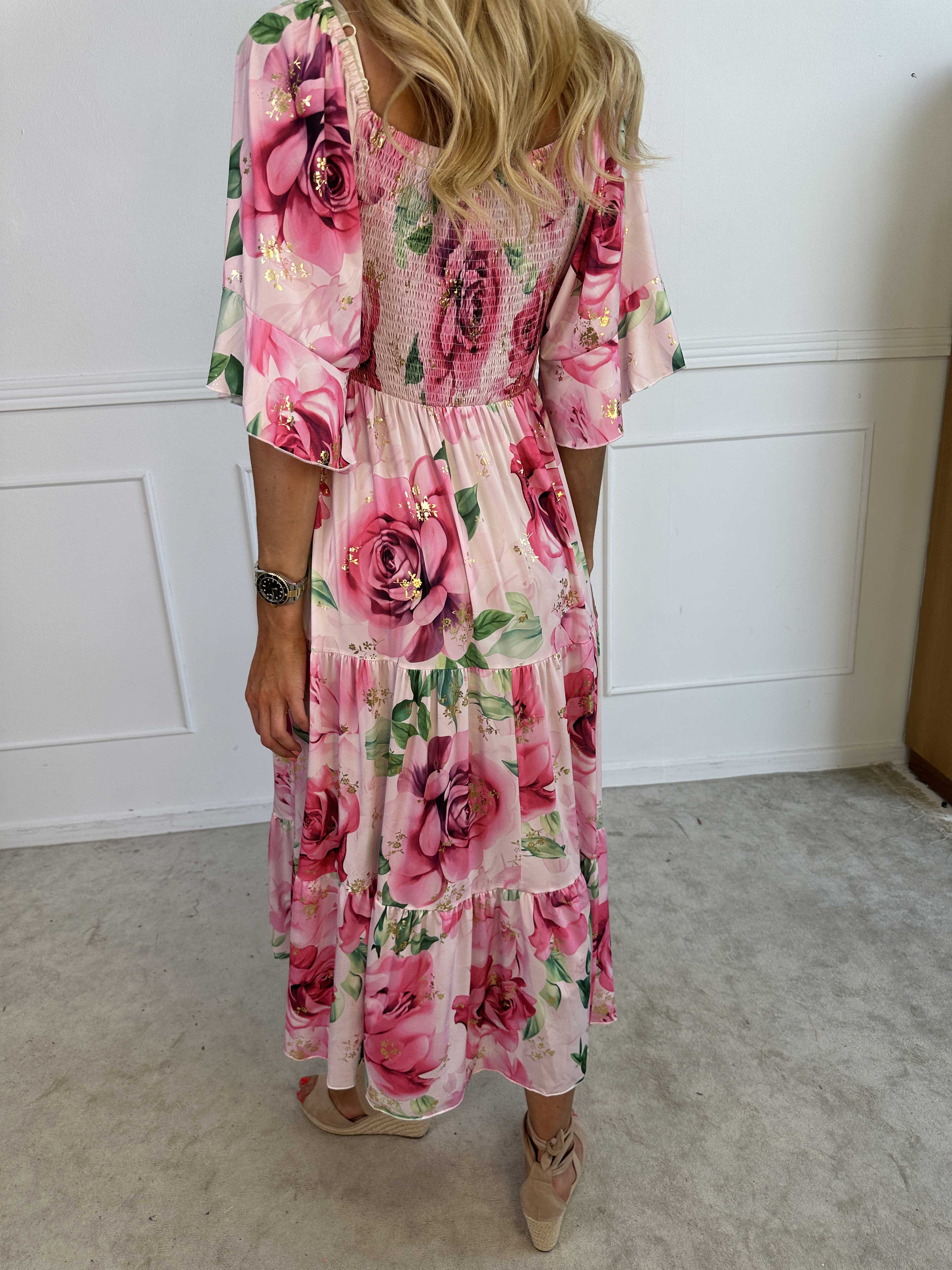 Elna Flower - Blommig elastisk klänning med resår över bysten